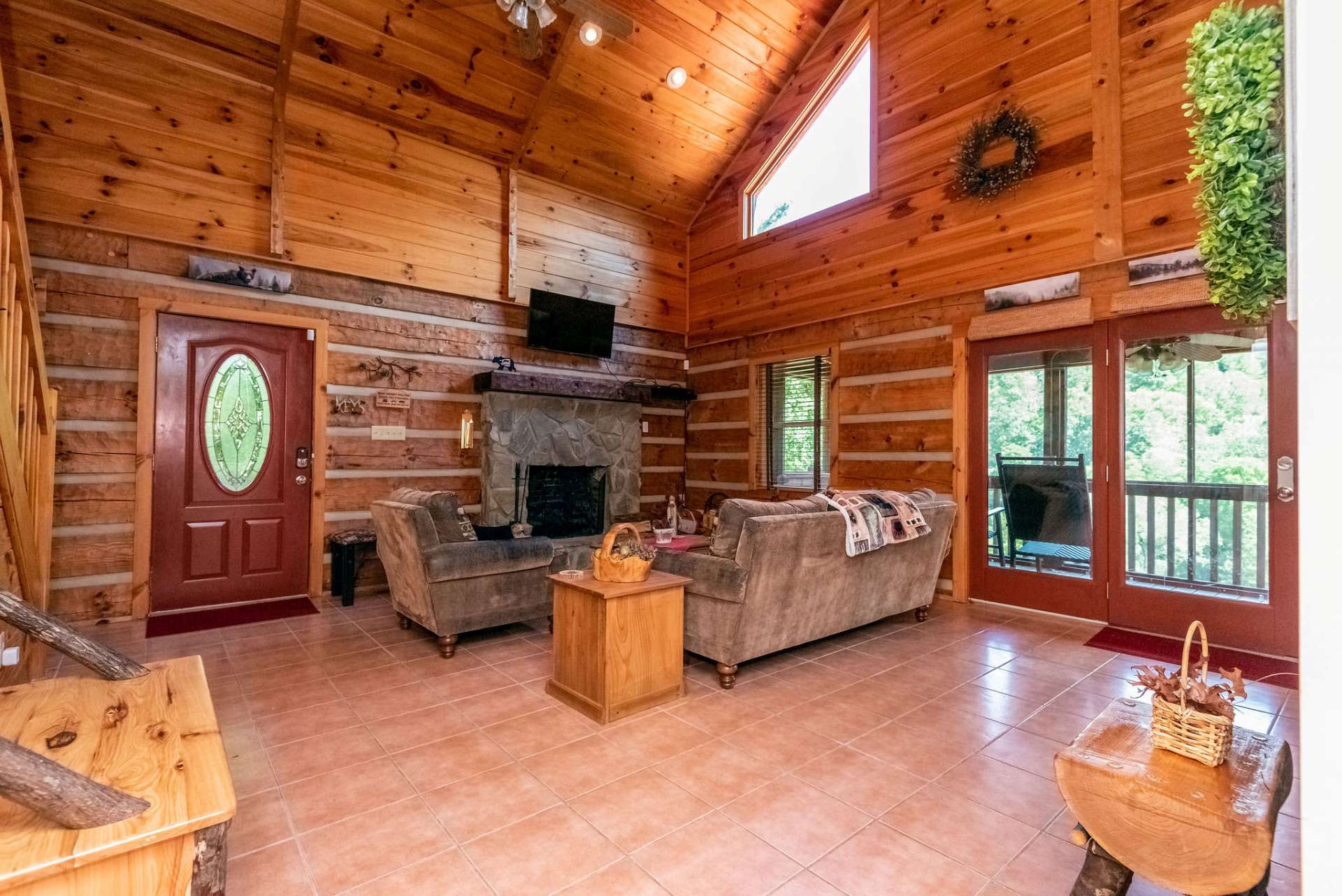 Main and lower level feature a warm terra cotta colored ceramic tile.