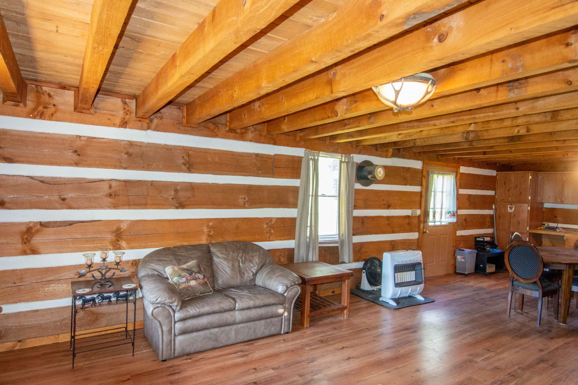 Open floor plan for easy transition from living area to the kitchen and dining areas.