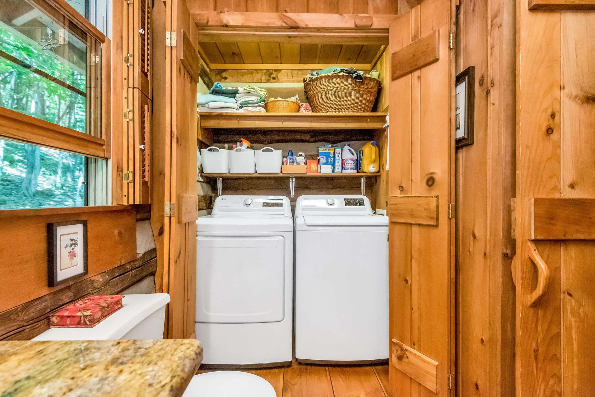 Laundry is conveniently located in the primary bath.