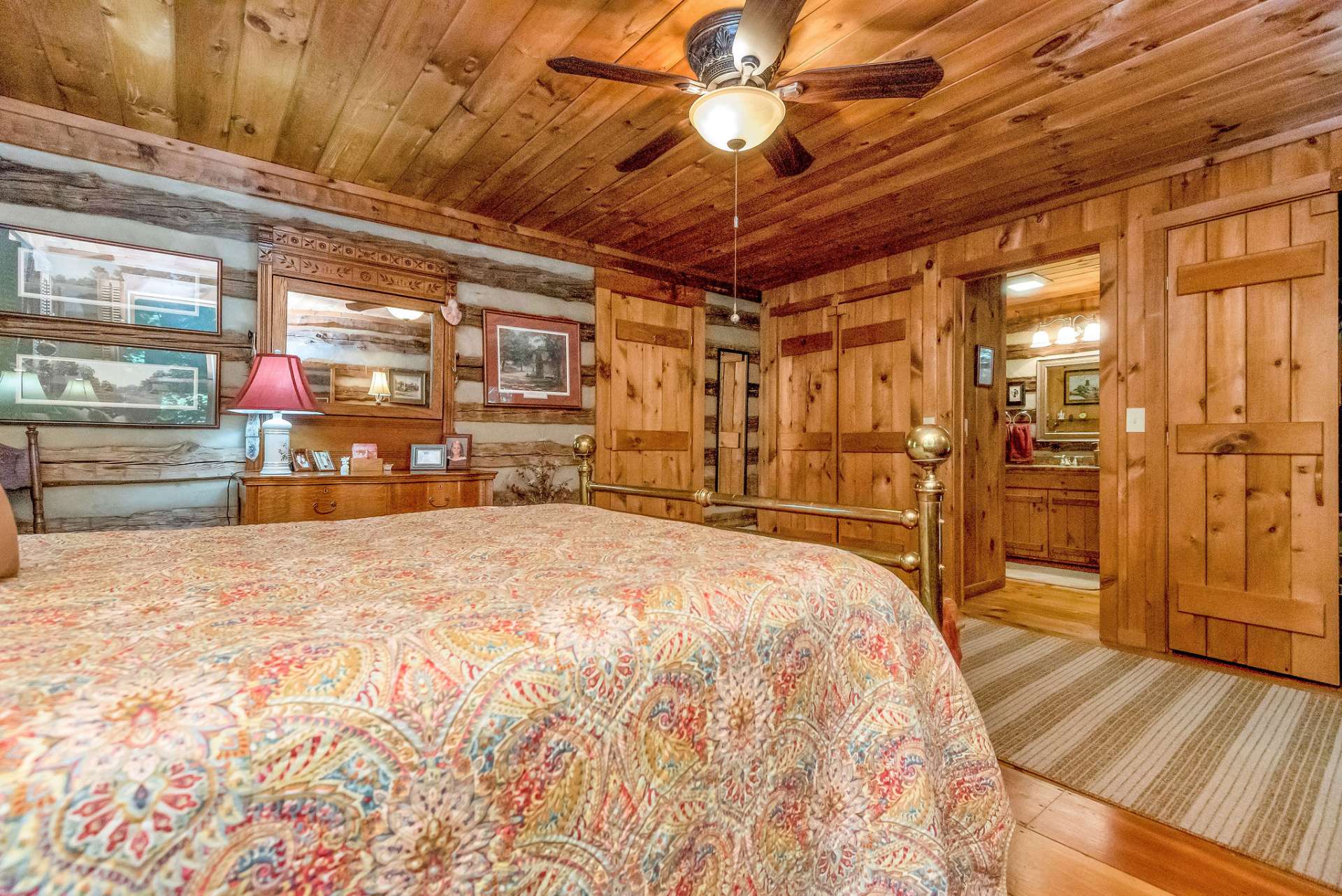 The antique logs and wood accents keep the rustic ambiance throughout the home.