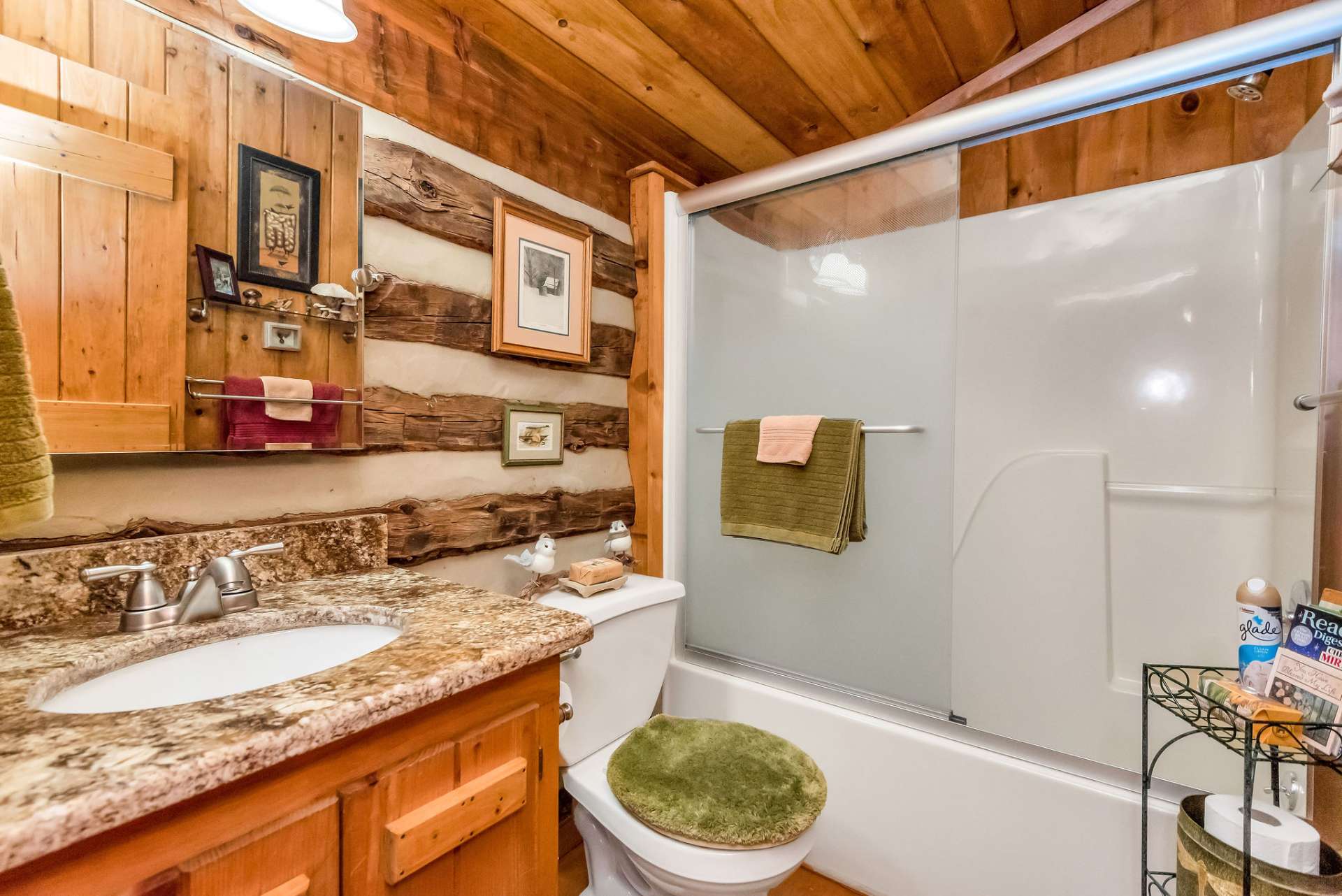 Family and friends will appreciate the full guest bath accommodations with granite counter-tops.
