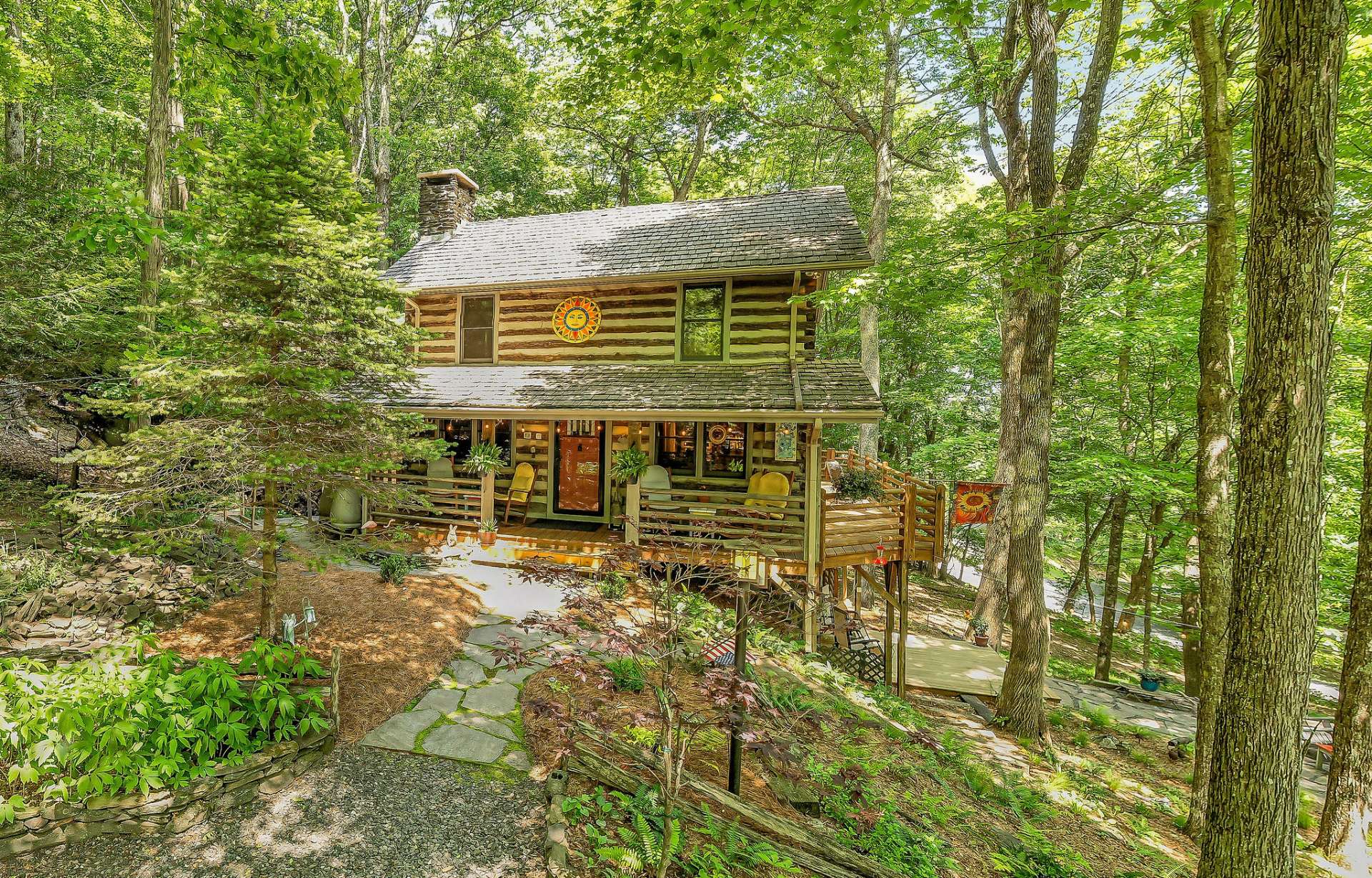 This charming getaway is embraced by the native mountain foliage and hardwoods.