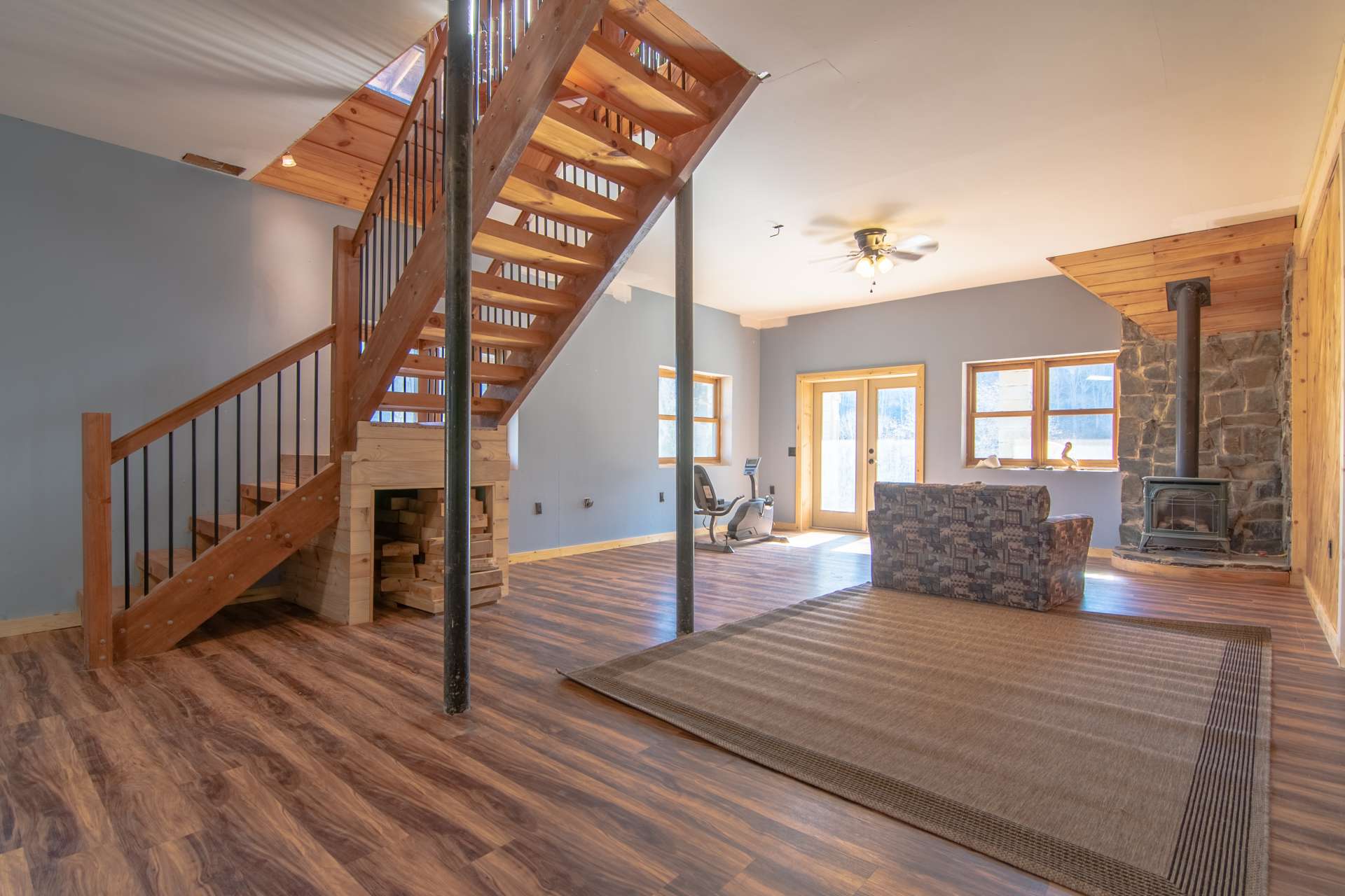 On the lower level, you will find a large  family or game room, the third master suite option, full bath, and access to the lower patio with hot tub.