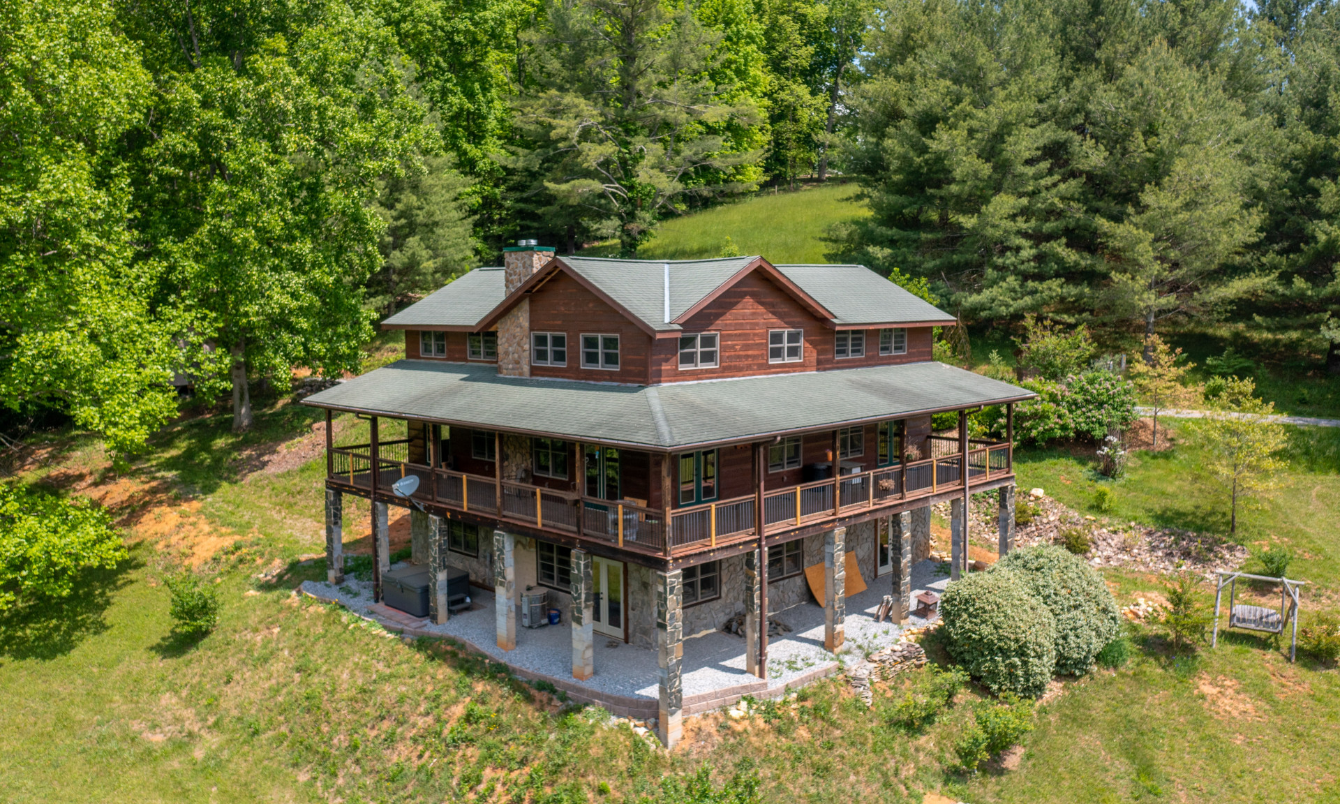 This 3-bedroom, 3.5-bath home is located in Cooper Cove, a quiet peaceful river community in the Crumpler area of Ashe County.