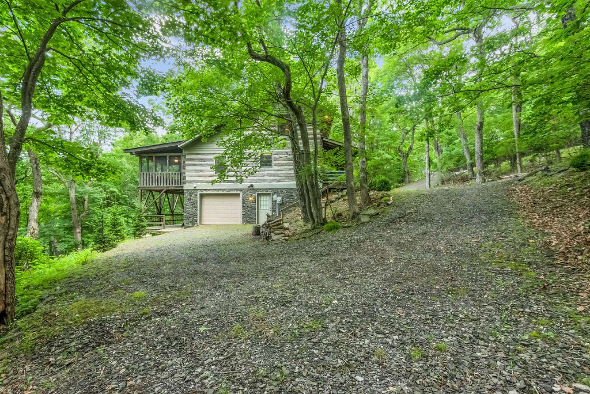 The cabin is situated in a private wooded setting.