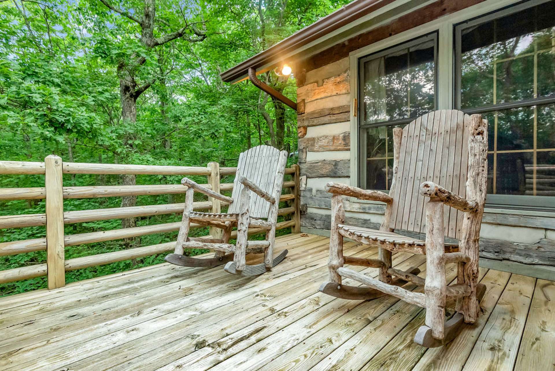 The open back deck offers privacy and is the prime spot for listening to the birds.