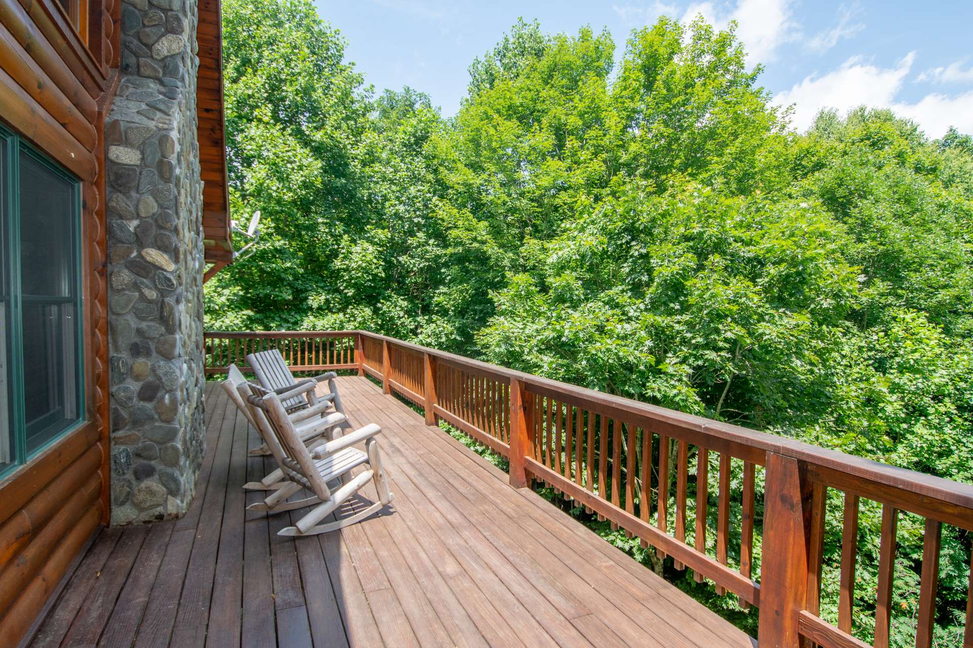 Enjoy mountain views  and gentle mountain breezes with this log cabin in the NC Mountains.