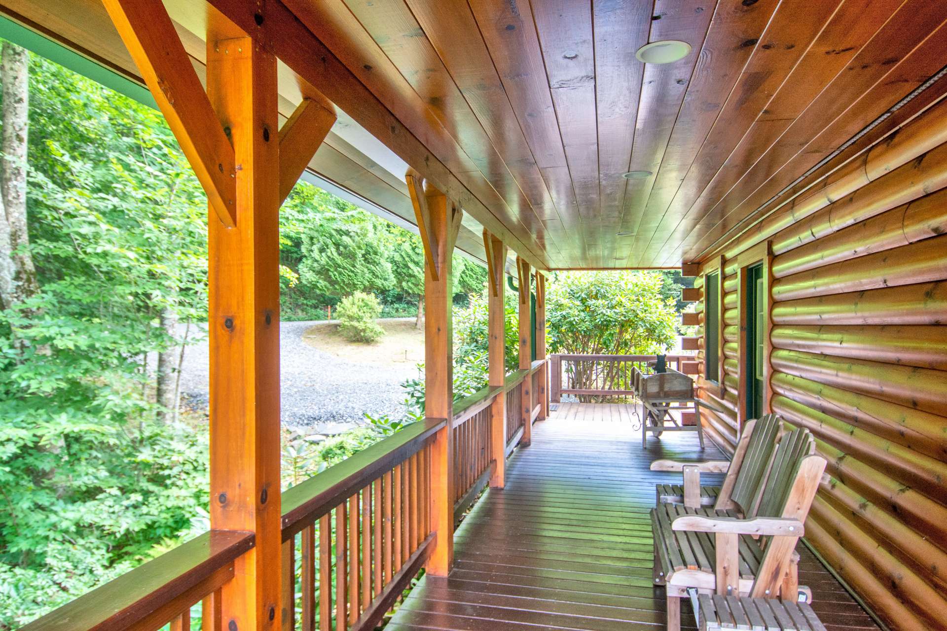 Relax on either of the covered porches and enjoy the fresh mountain air and the sounds of the mountain brook flowing below.