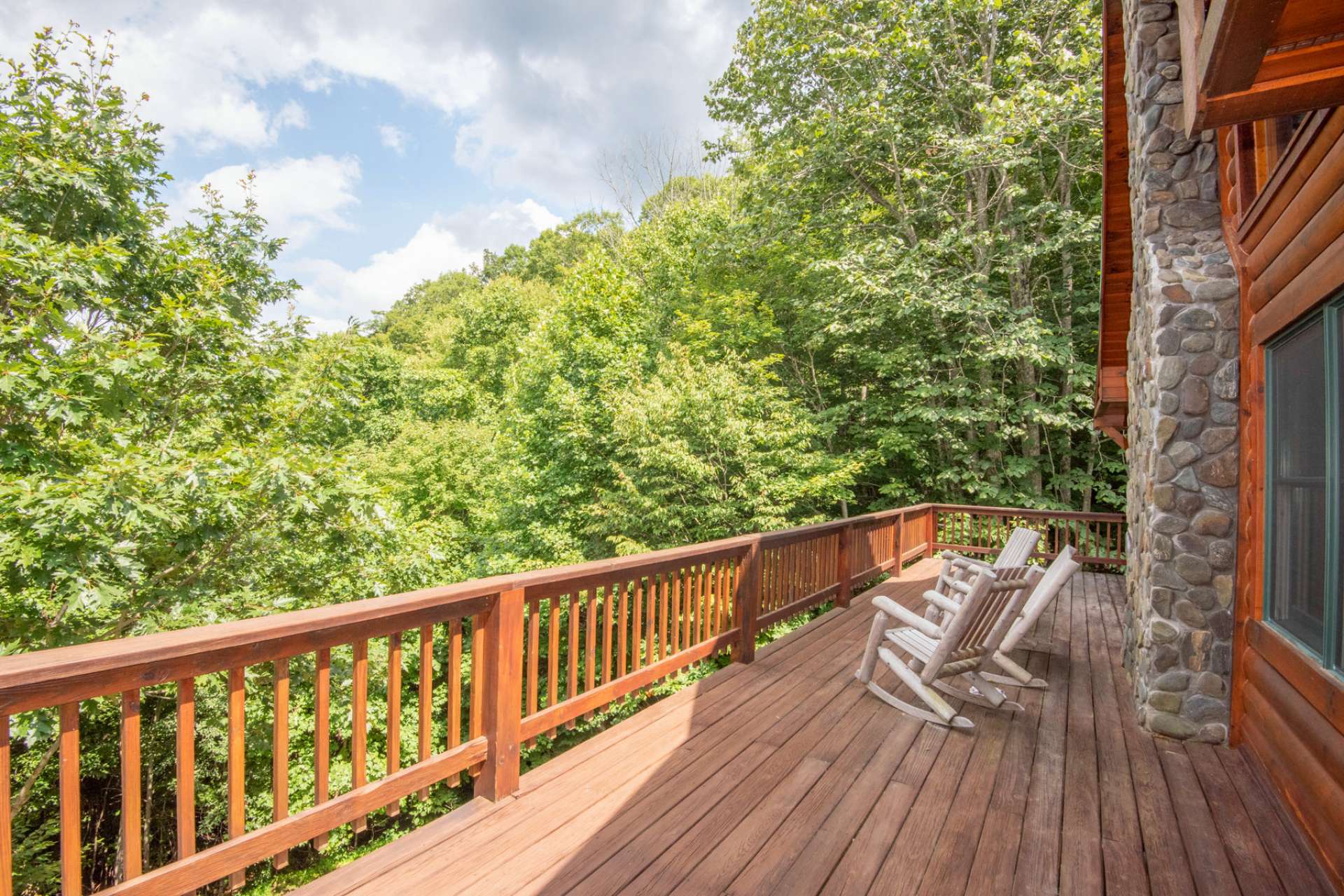 Relax on either of the covered porches and enjoy the fresh mountain air and the sounds of the mountain brook flowing below.