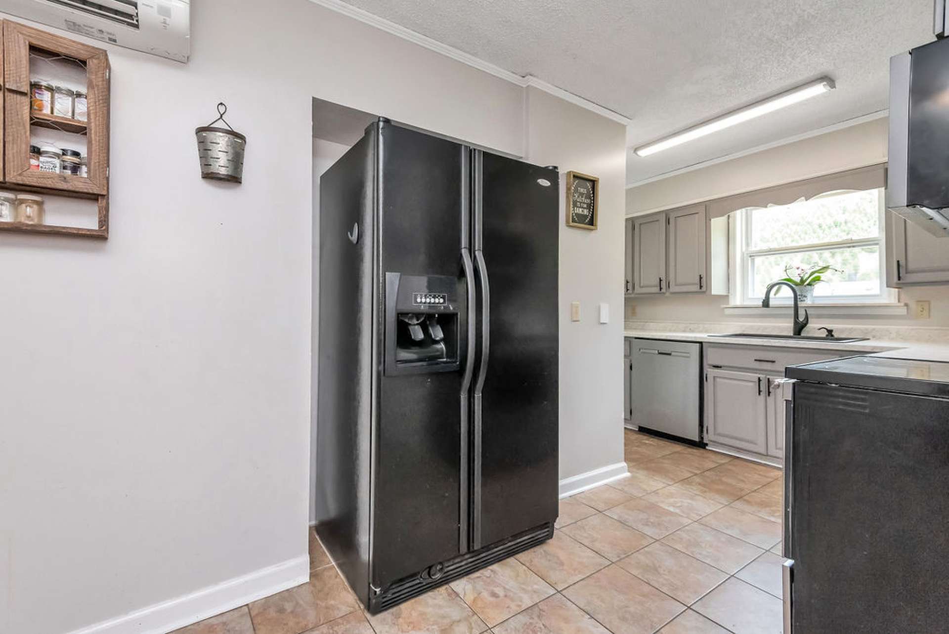 This kitchen offers updated appliances and...