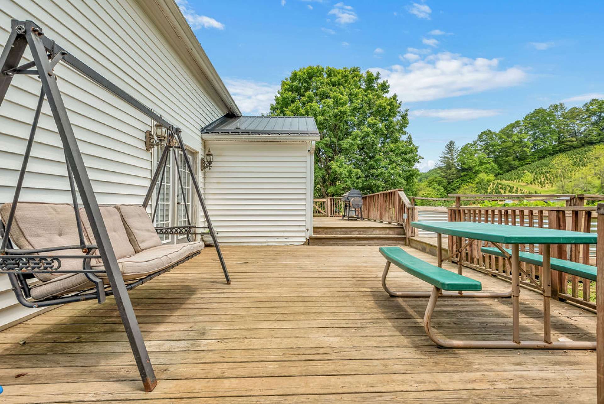 Great outdoor spaces and a raised garden off of back deck.