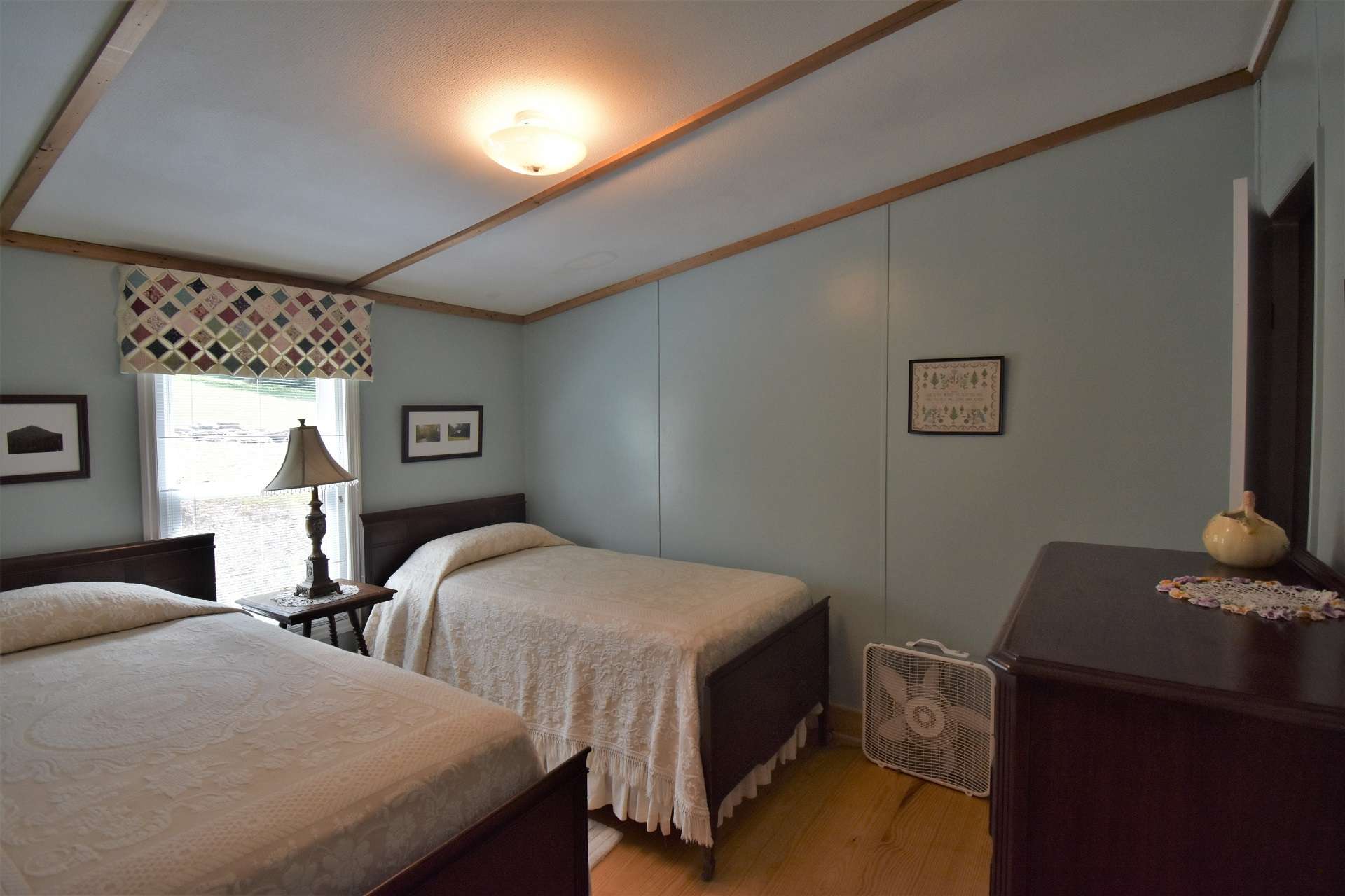 Both guest bedrooms are spacious and light filled, and share a full bath.