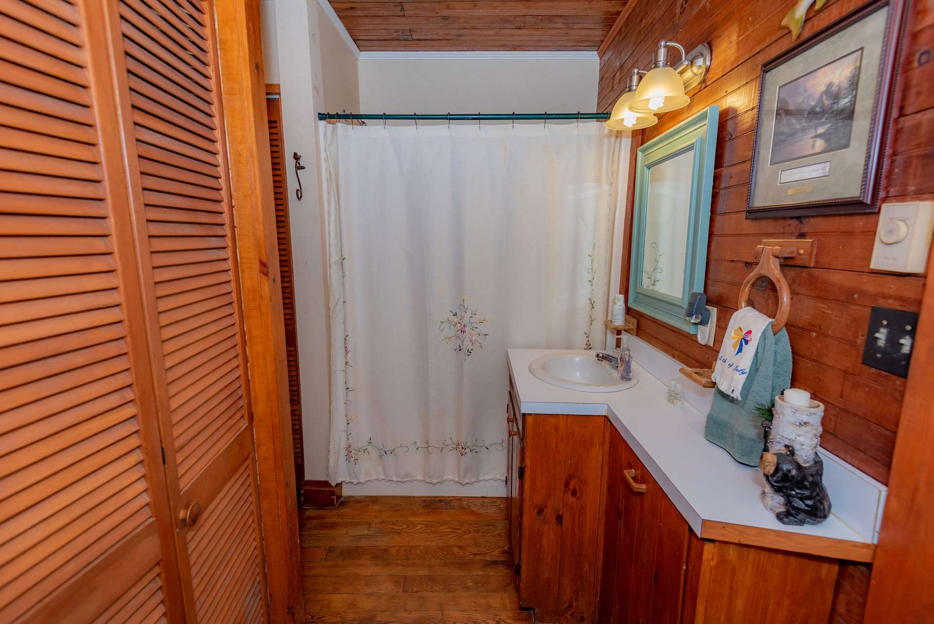 A laundry room and full bath complete the main level.