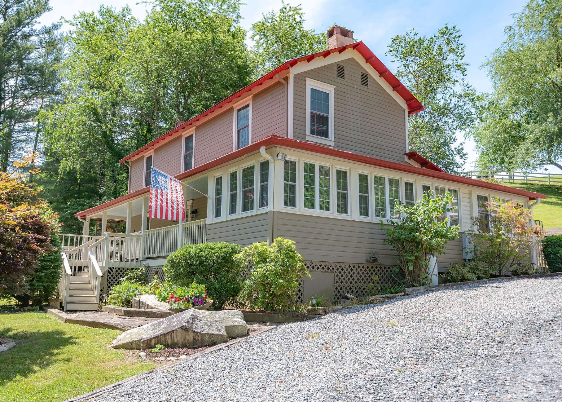 This beautiful farmhouse property is located just off of Garvey Bridge Road in the Crumpler area of Ashe County in the North Carolina High Country.