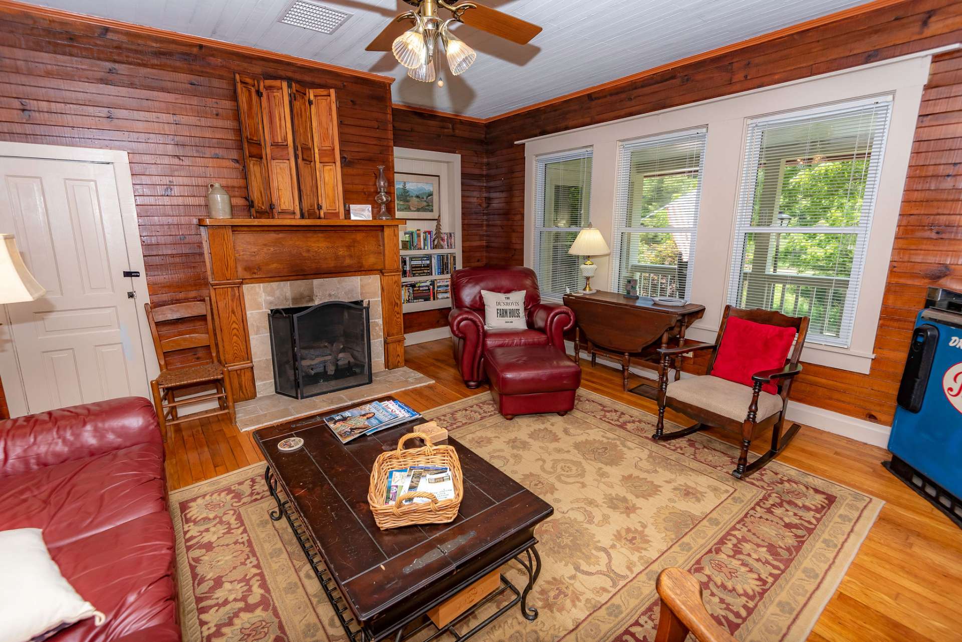 Large windows in the living room provide plenty of natural light.