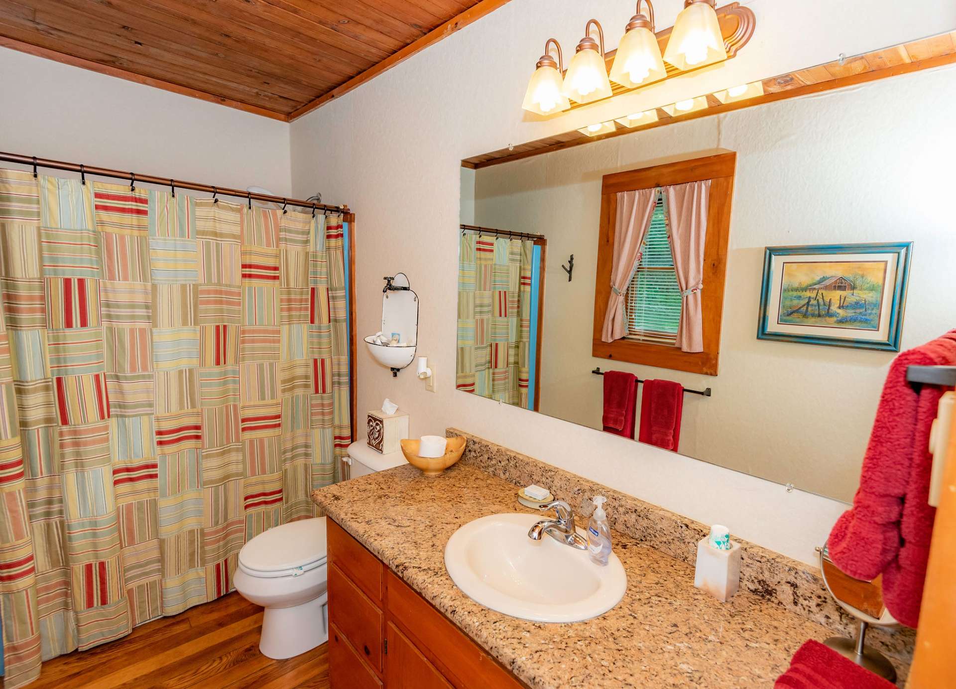 Private master bath with tub/shower combo.