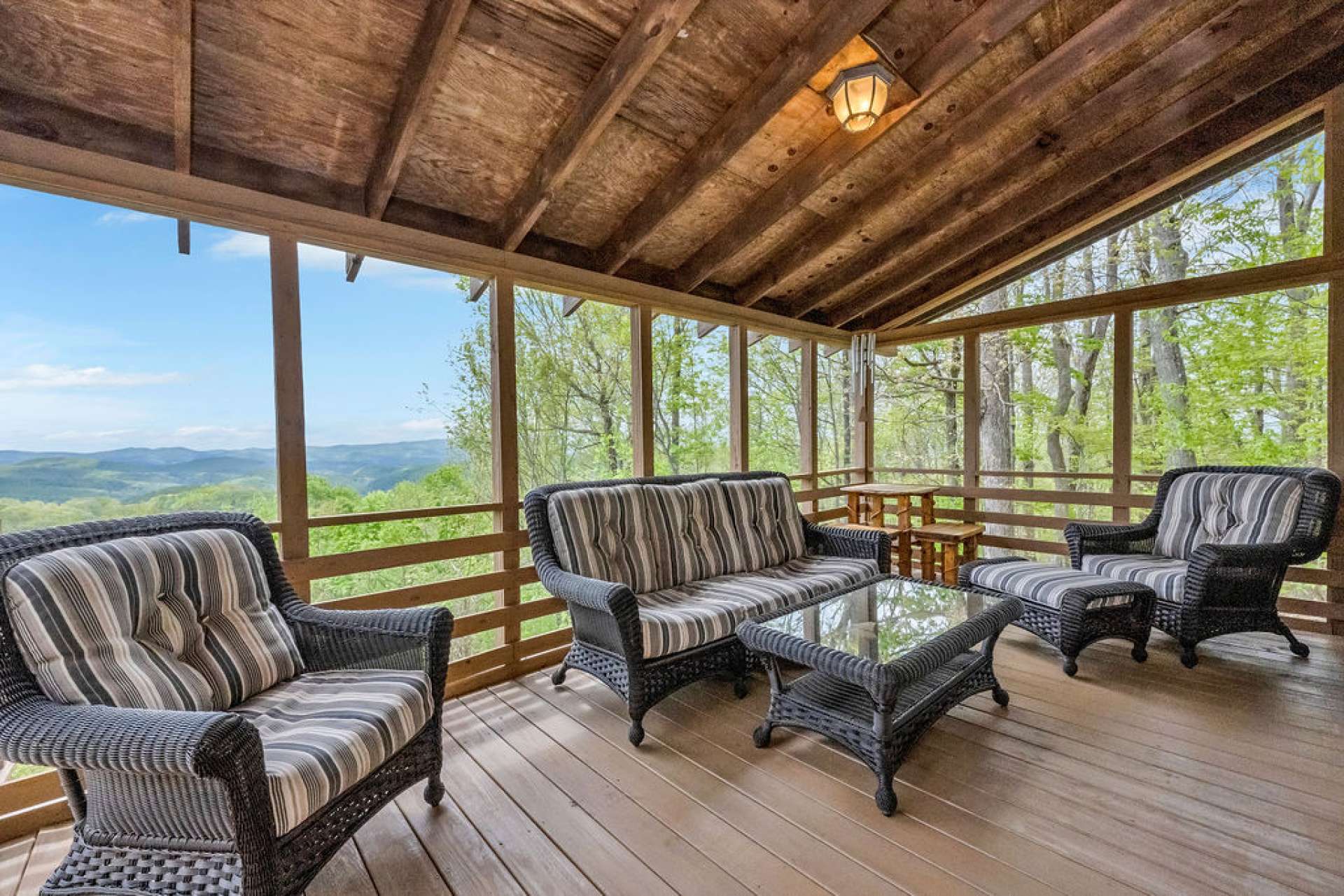 Step out from the primary bedroom to the screened porch to start the day with a cup of gratitude and end the day here with a glass of thankfulness.