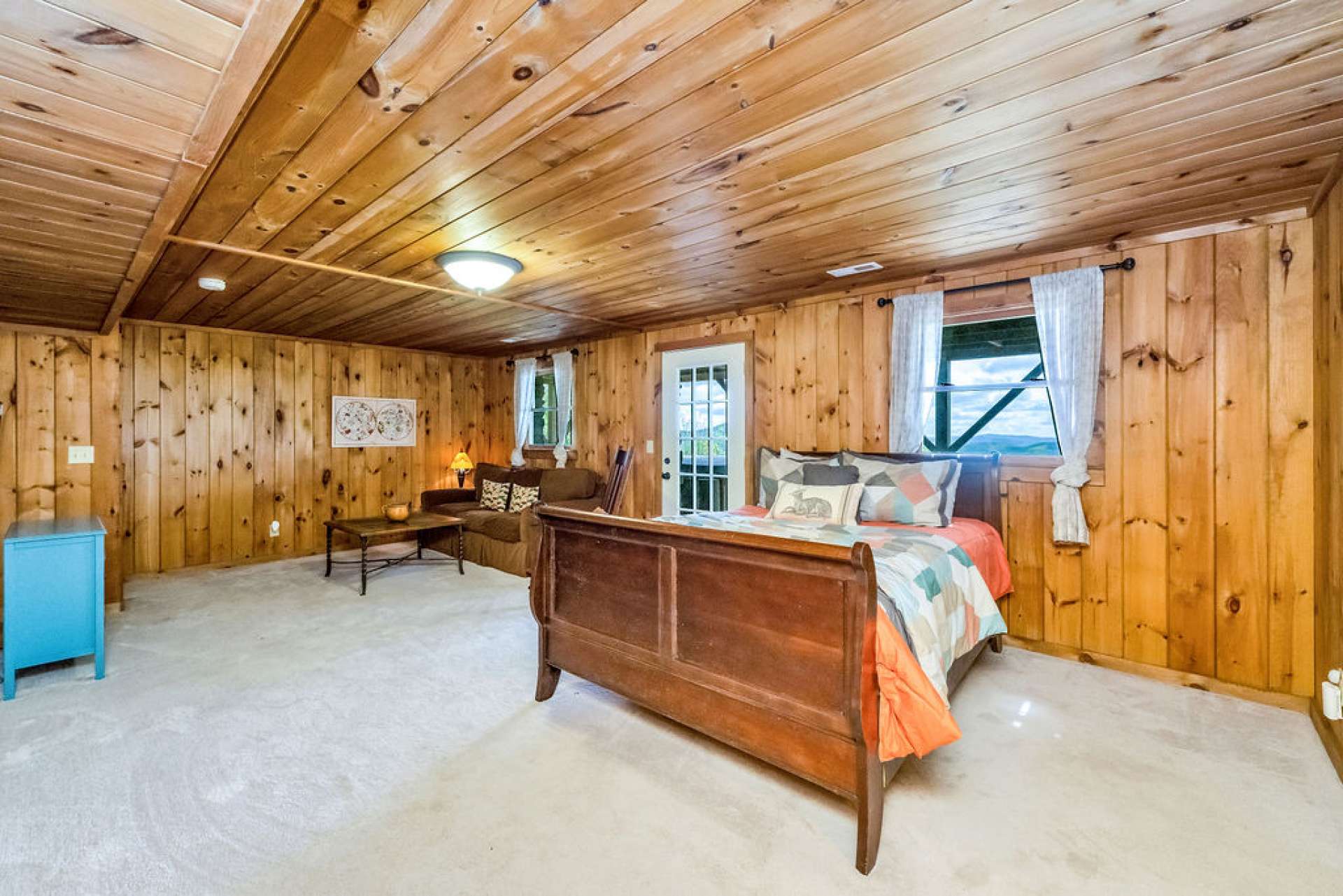 Step out to enjoy a lower-level deck with views and a hot tub.