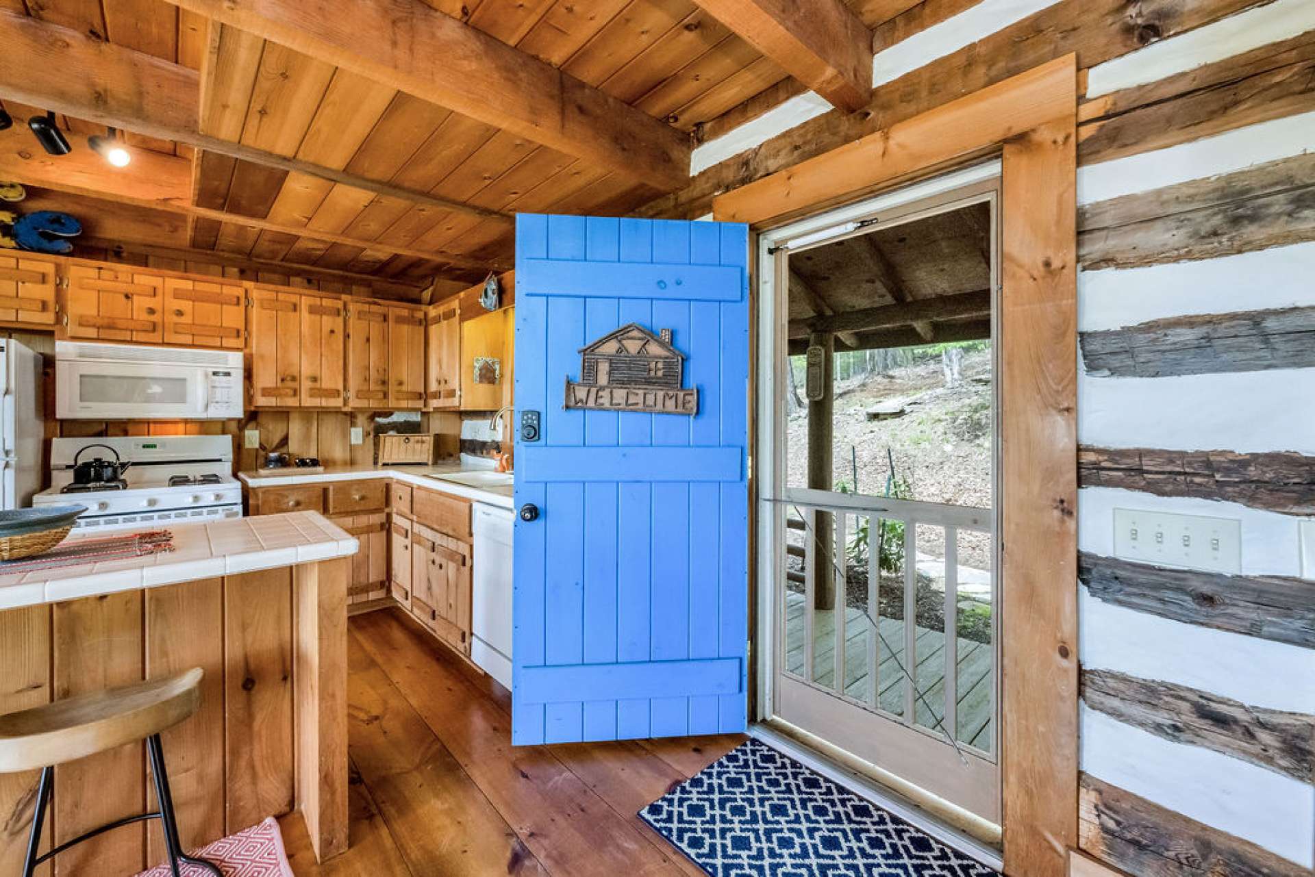 Welcome to your High Country retreat, where lasting memories are the goal. Even the front door's pop of whimsical color will announce to guests "Let the fun begin!!"