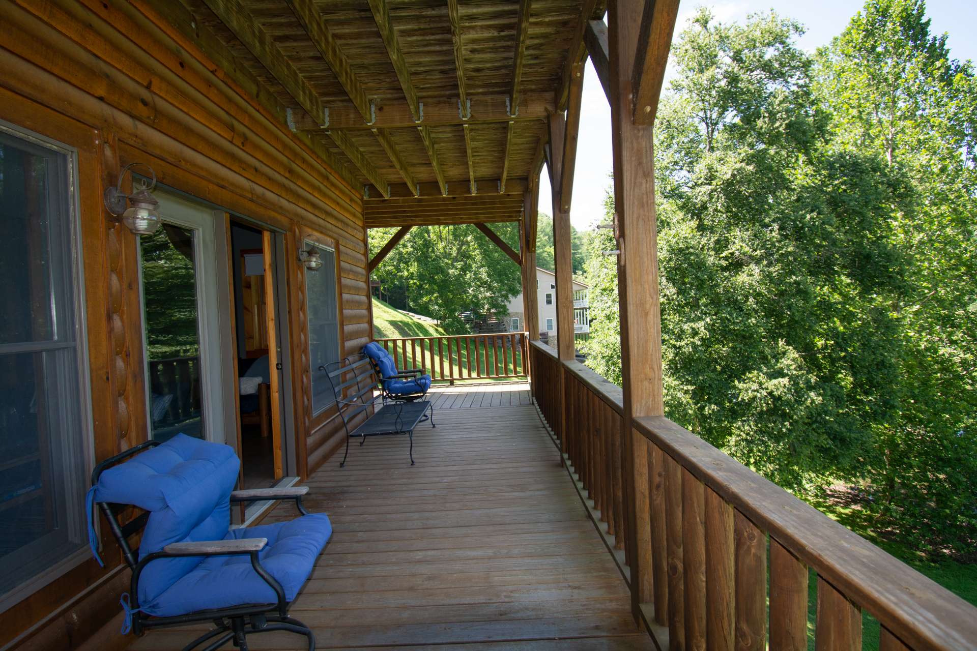 Enjoy the pastoral and river views with the mountains beyond from the lower level covered deck.