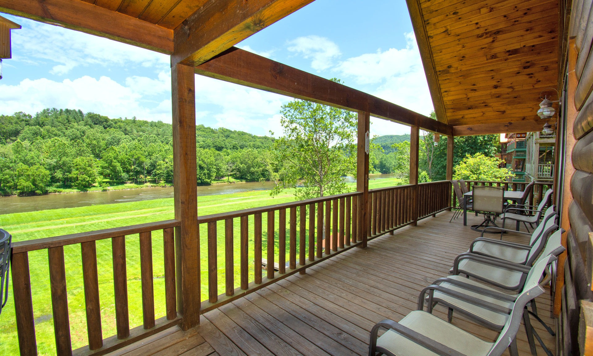 PANORAMIC RIVER VIEWS & RIVER FRONTAGE included with this log cabin in River Country Estates, a gated NC mountain community.