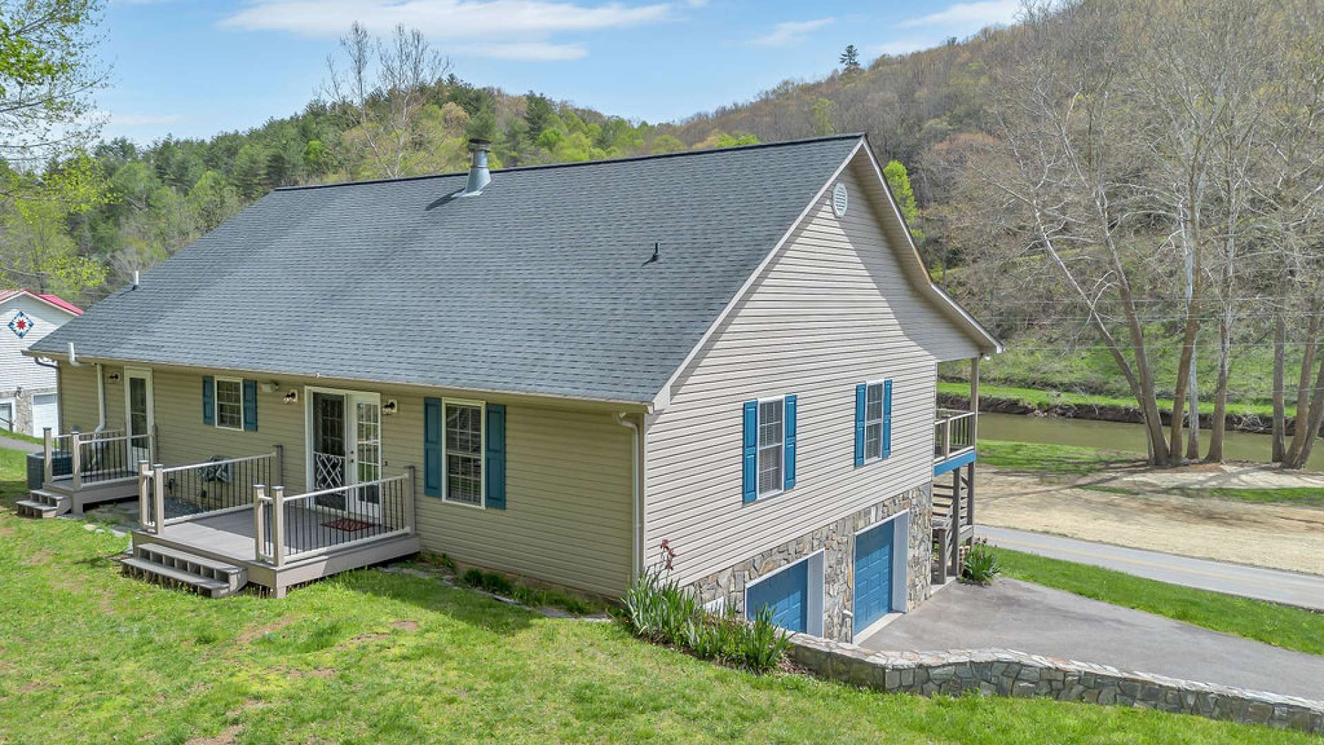 The backyard provides level entry into the home.