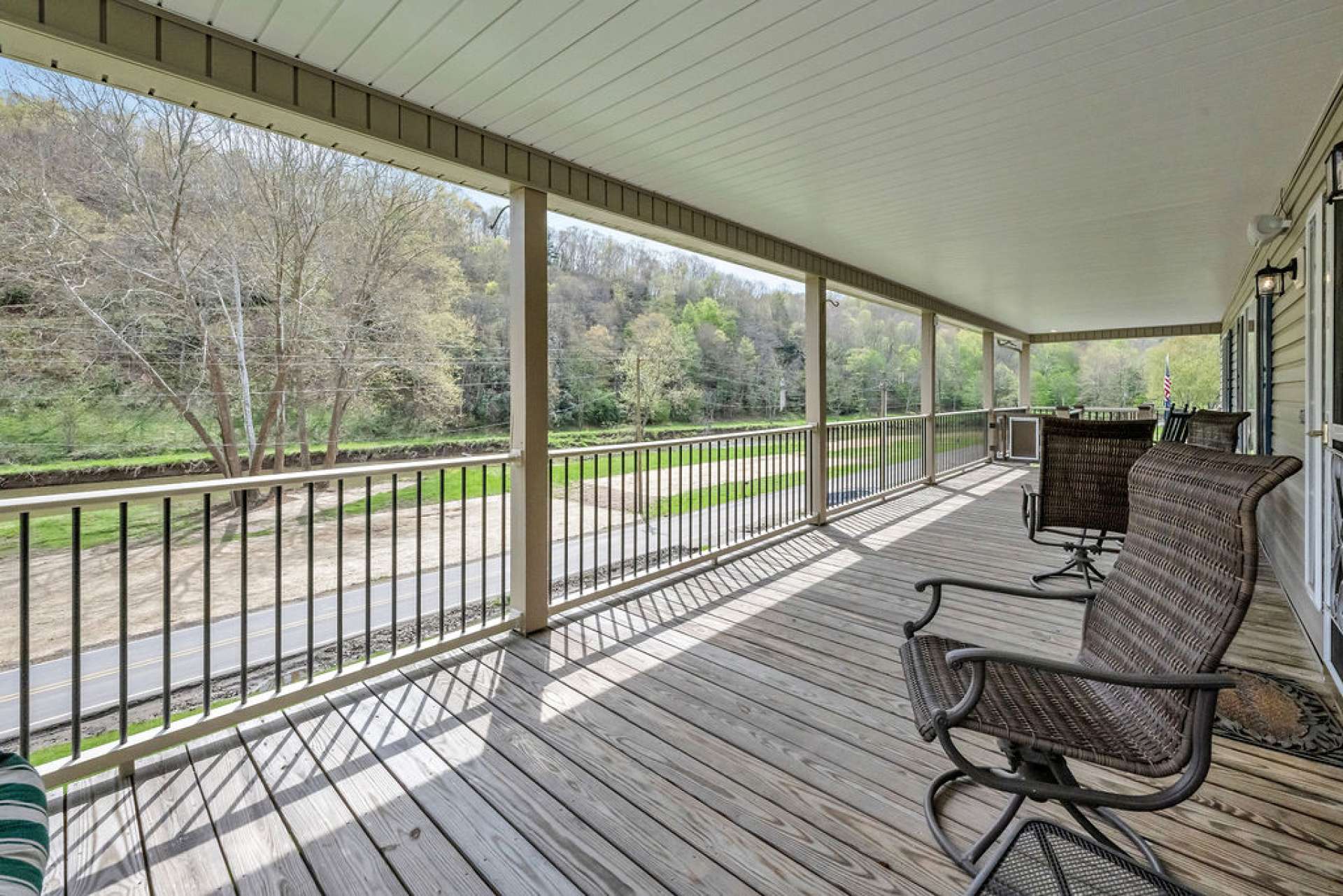 Step outside to the covered upper deck, where you’ll savor stunning river views while entertaining guests rain or shine.
