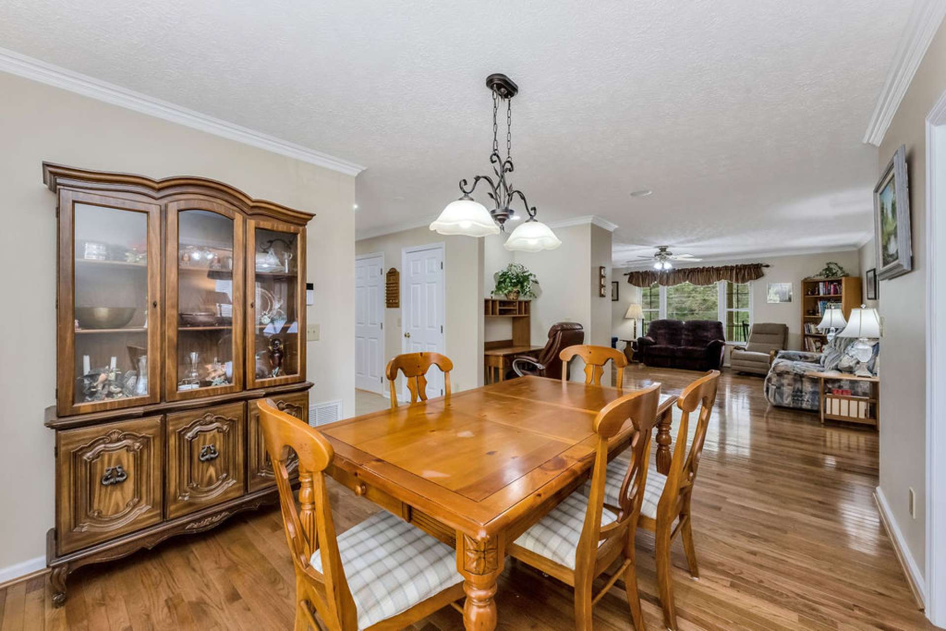 Between the living room and dining room is a built-in desk area for catching up on emails.