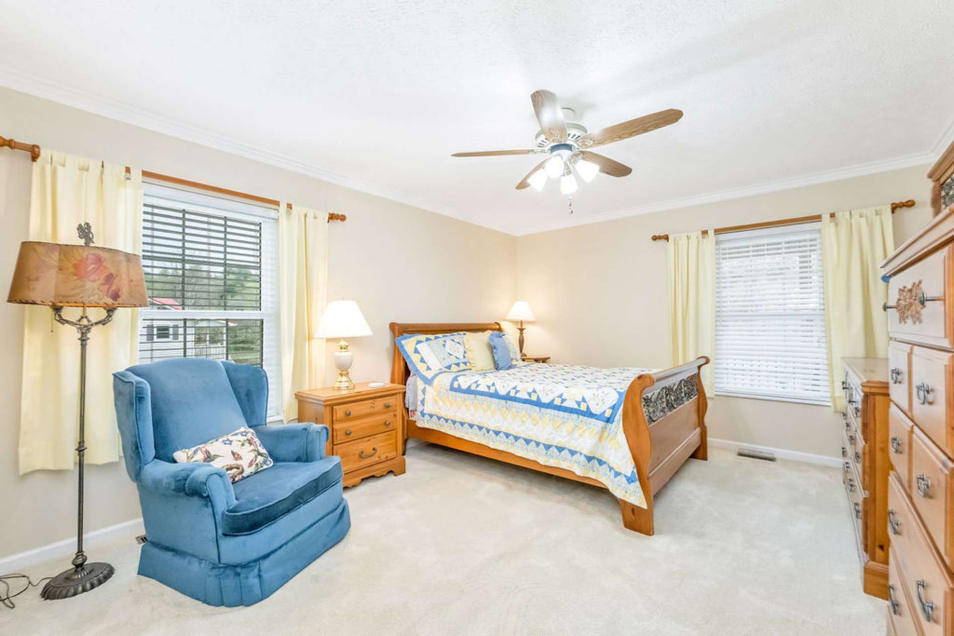 The primary bedroom creates a space for solitude and rest.
