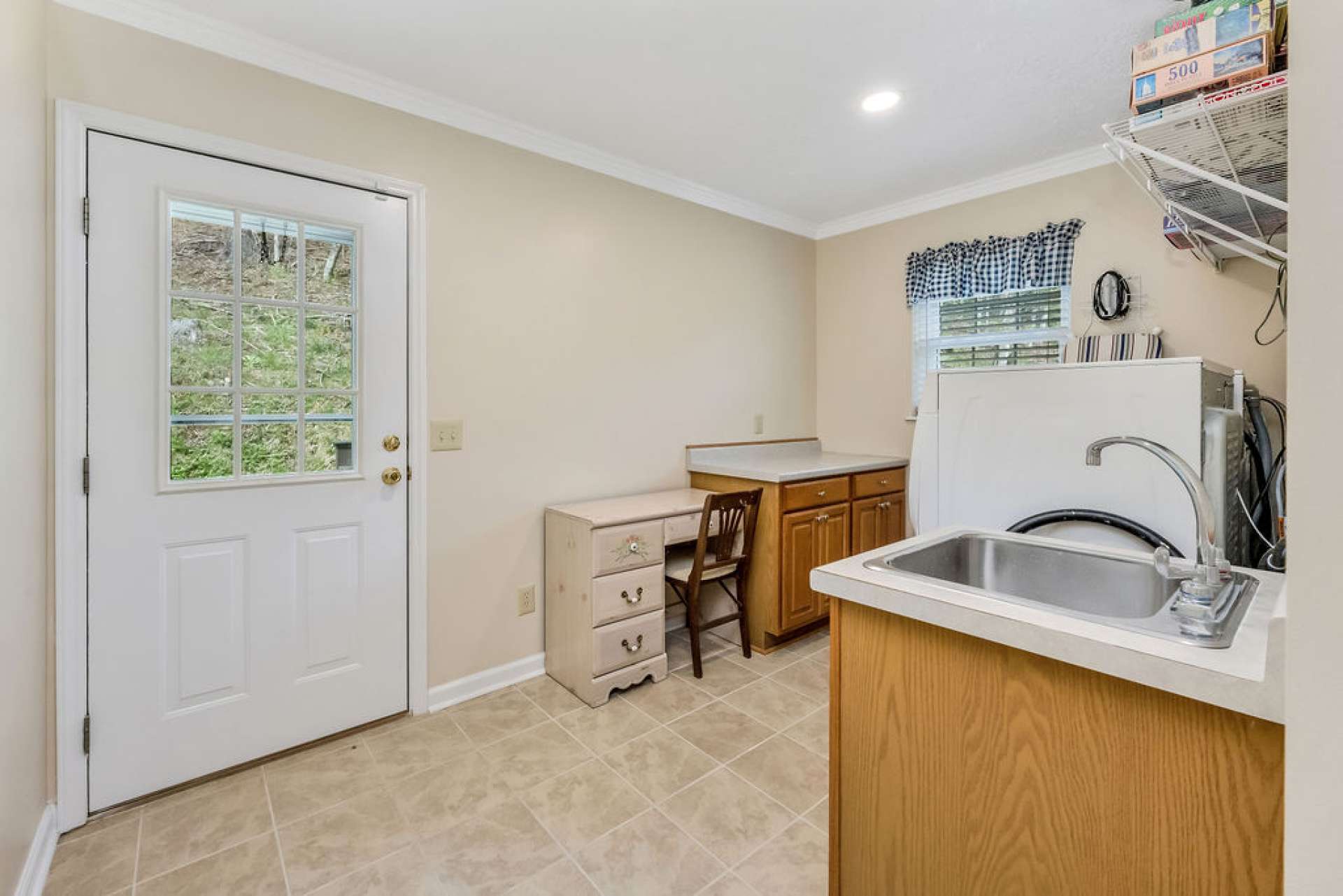 You can use the laundry room as a mud room and enter in from the back yard.