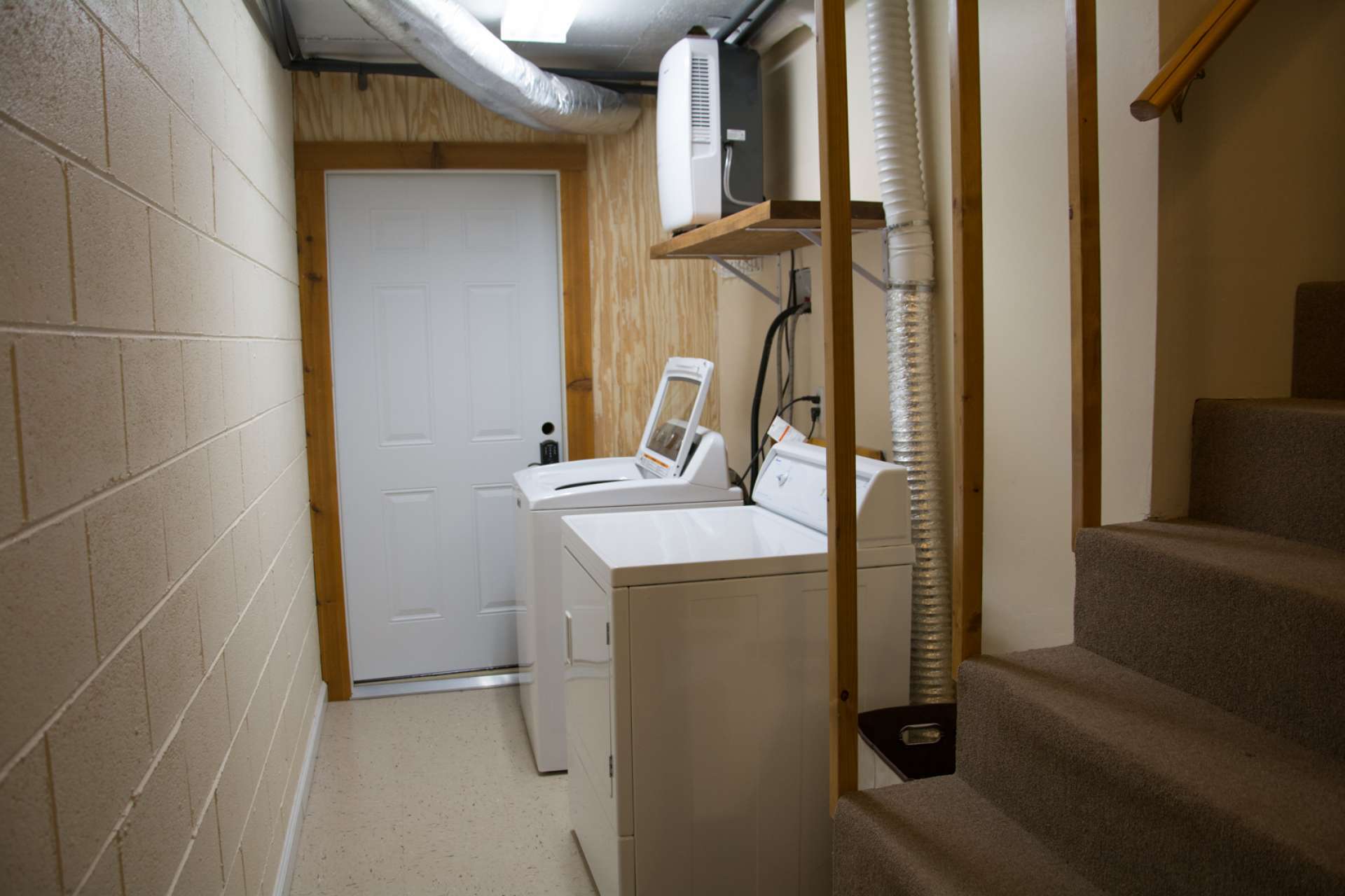 A  1-car garage and lower level patio completes the lower level.