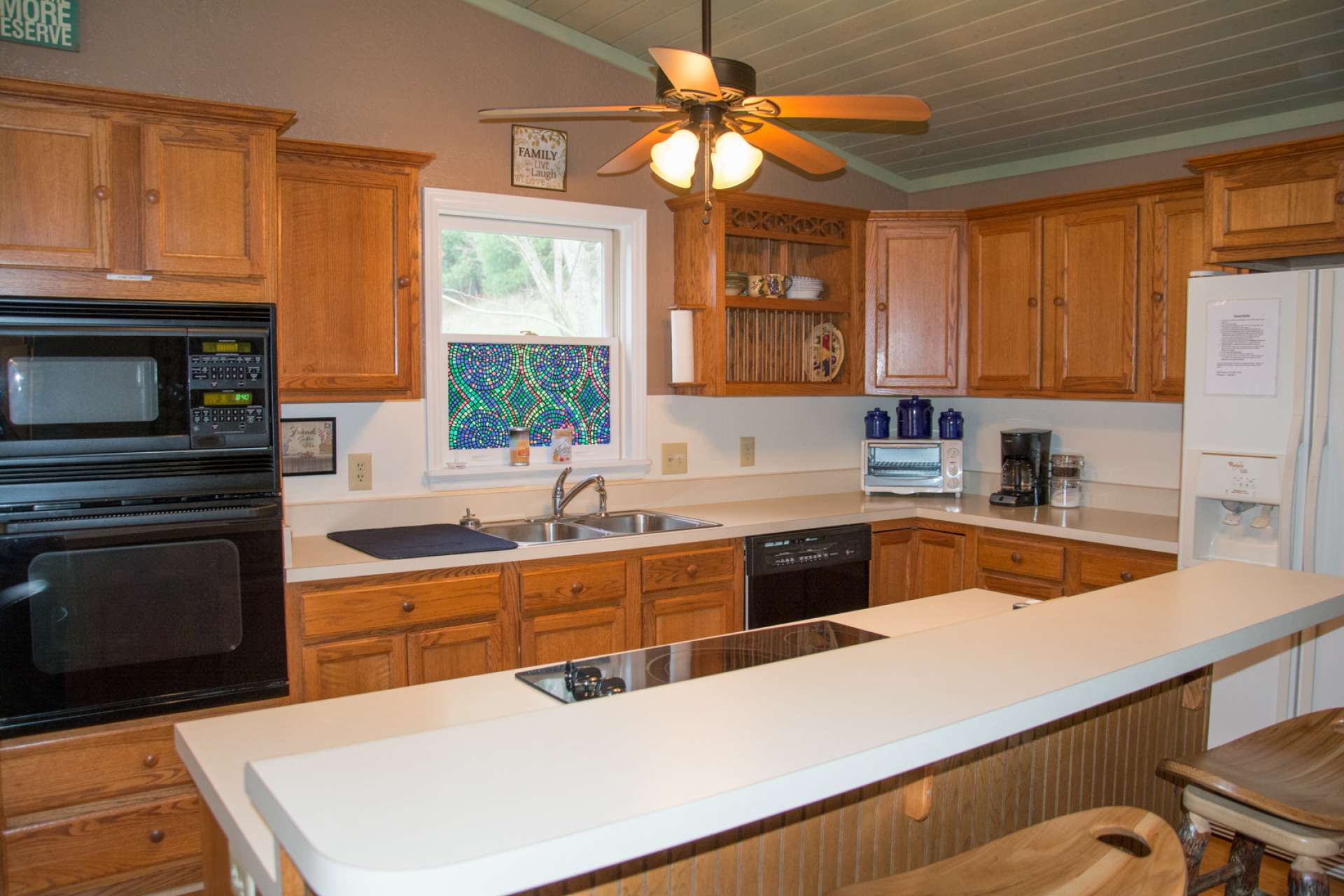 The living room is open to the kitchen and dining areas providing  ease of transition when entertaining.