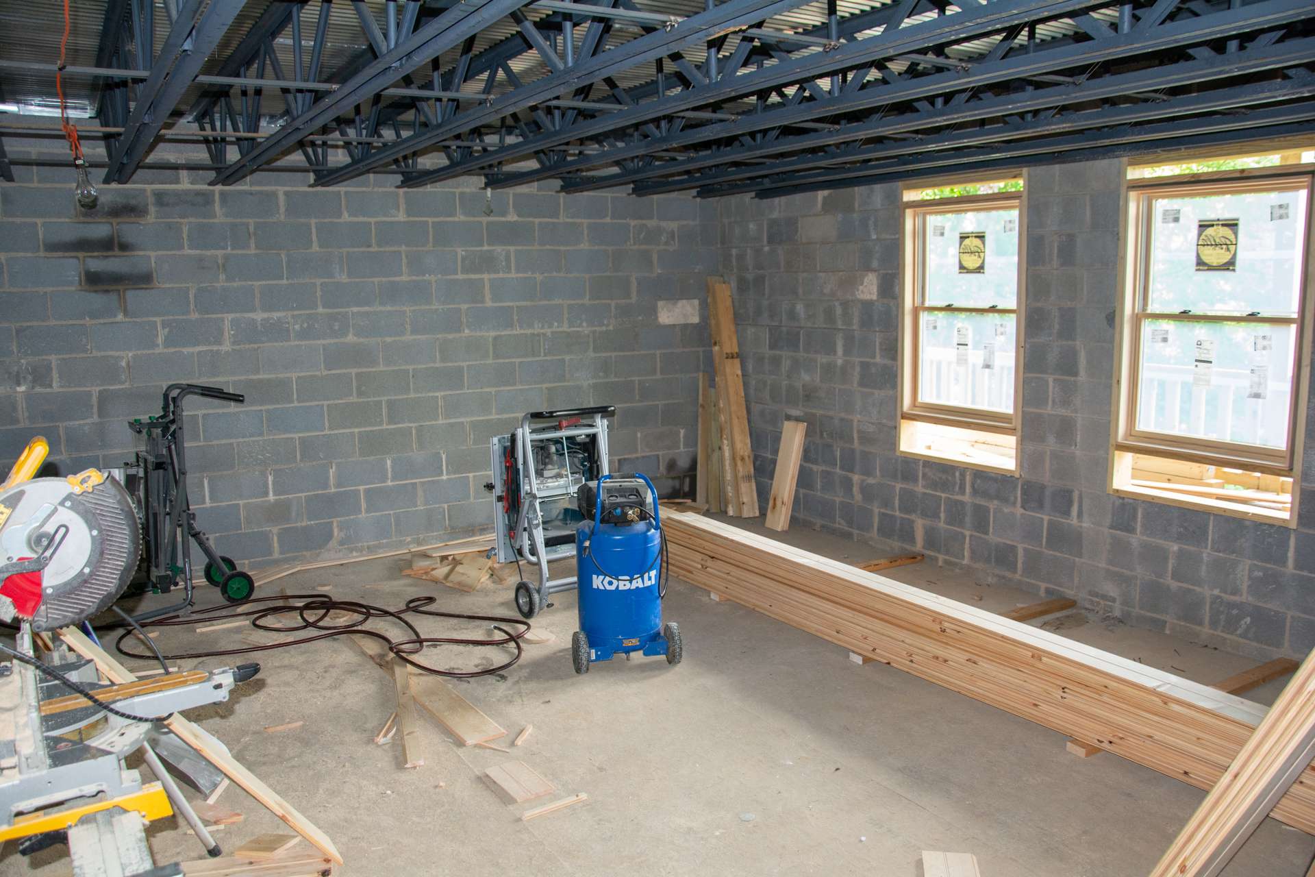 To complete the main level, a large workshop area is ideal for home projects.