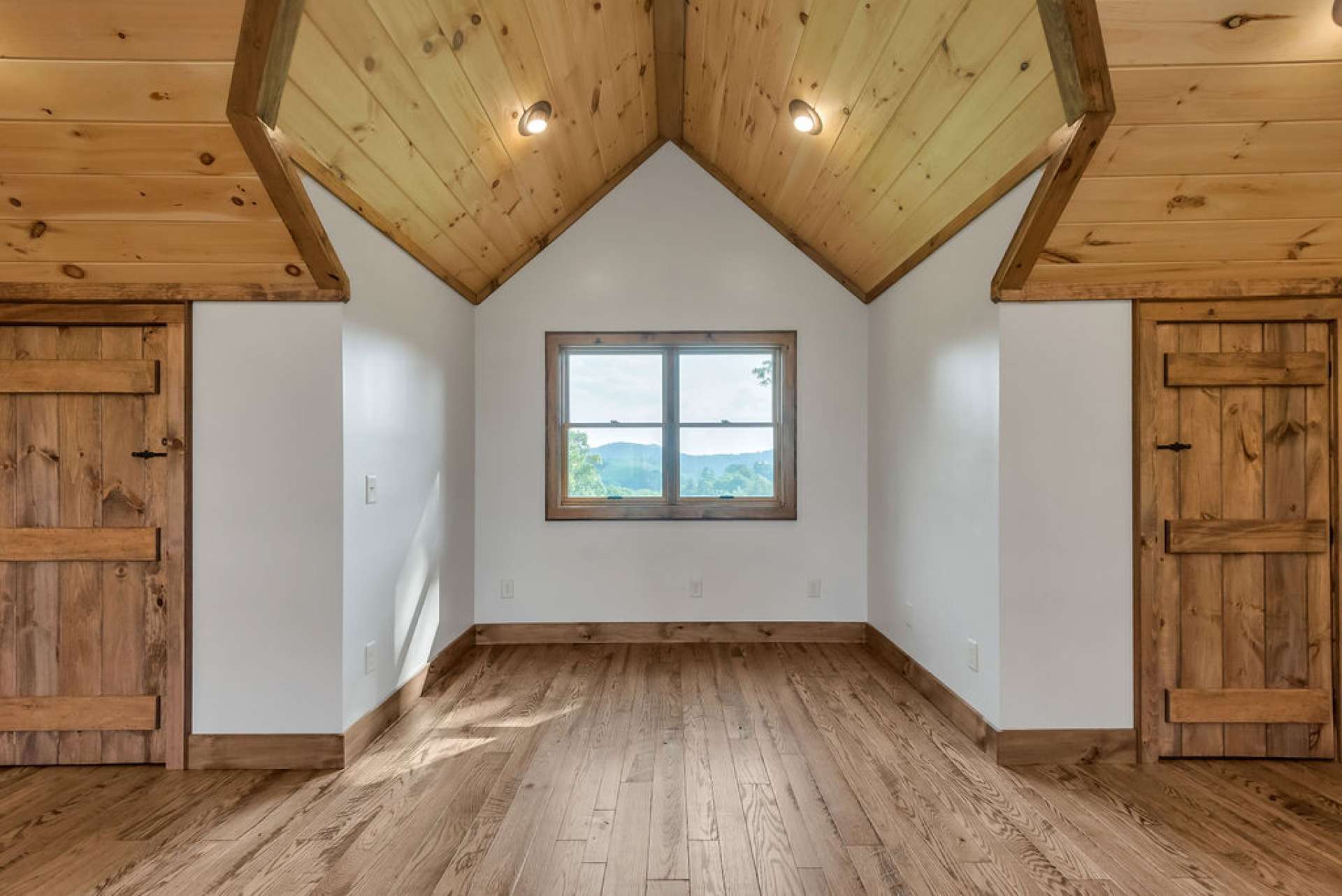 The loft windows provide the view of the adjoining Christmas tree farm.