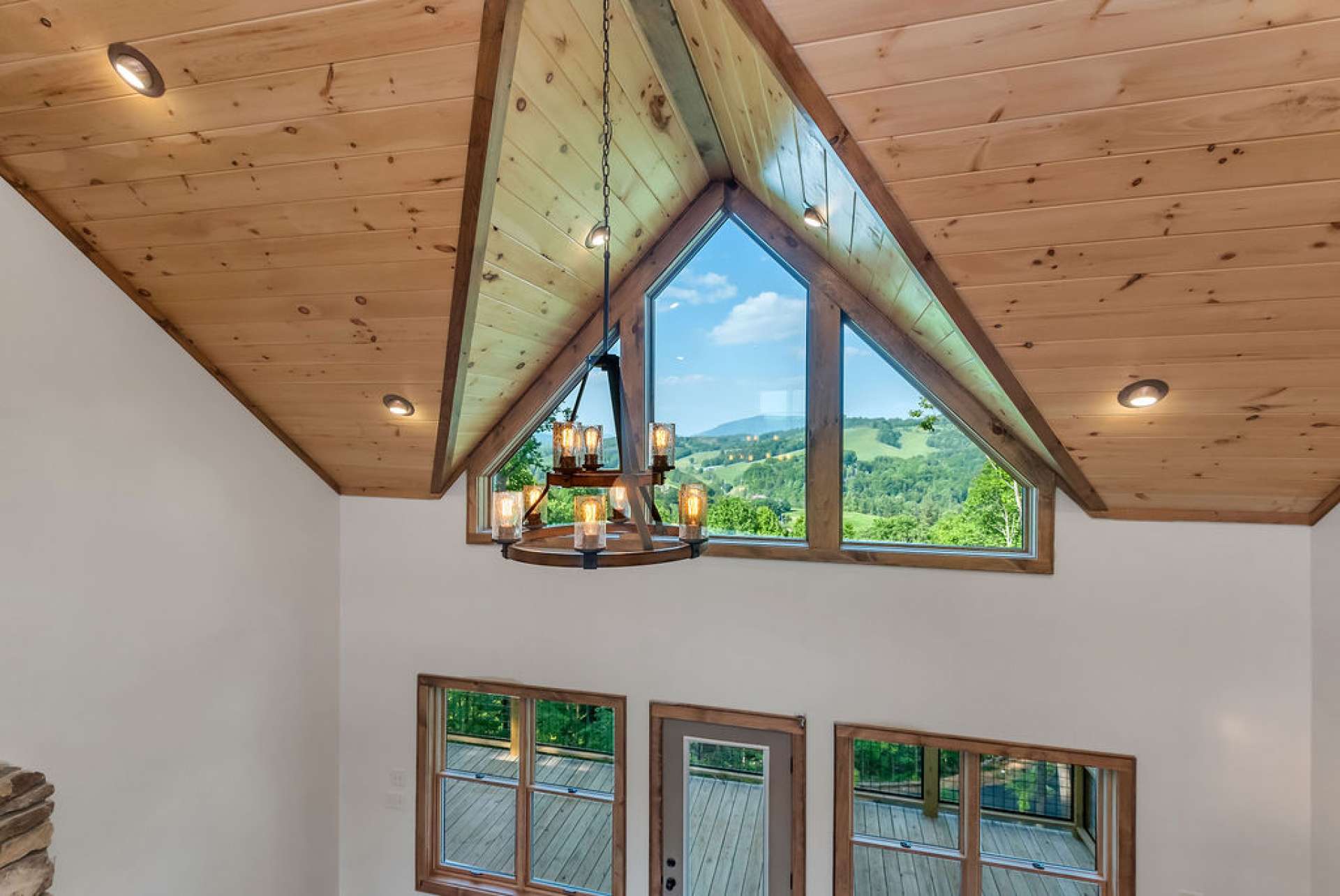 The high windows in front provide the gorgeous mountain view from the loft as well.