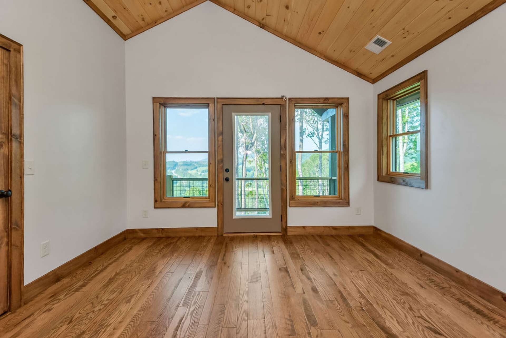 Upper level features two guest bedrooms.