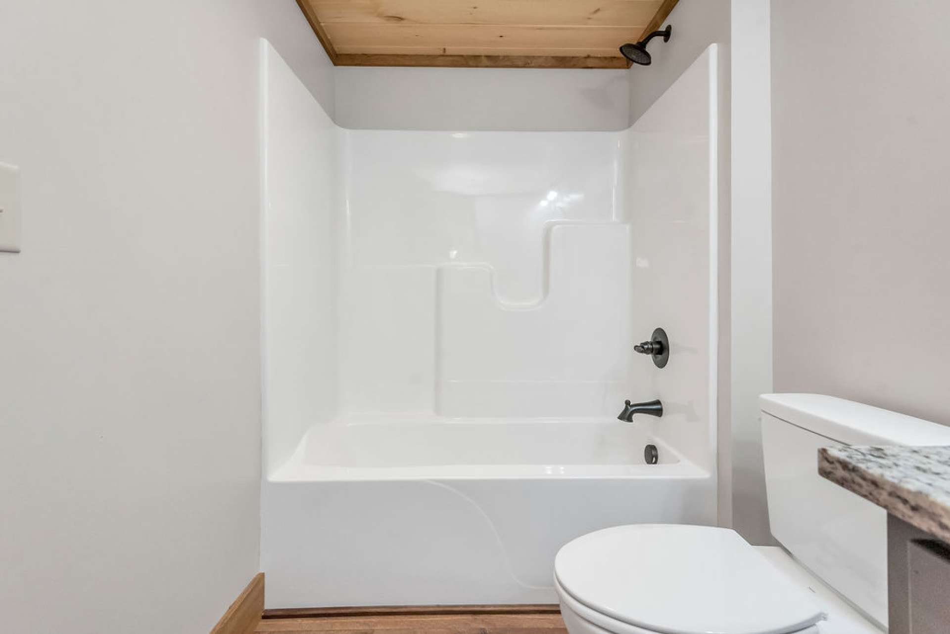 Upper level bath includes fiberglass tub/shower and...