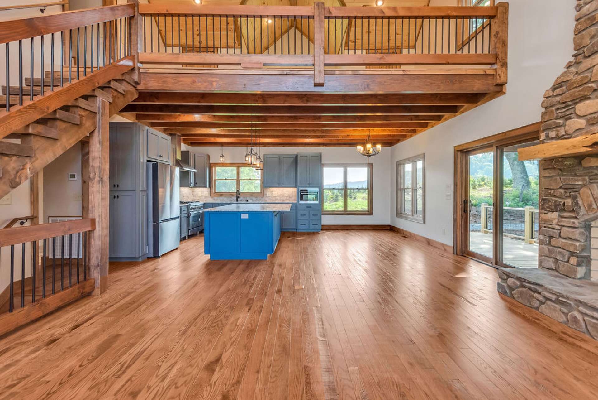 Gleaming circle sawn red oak flooring throughout main and upper levels.