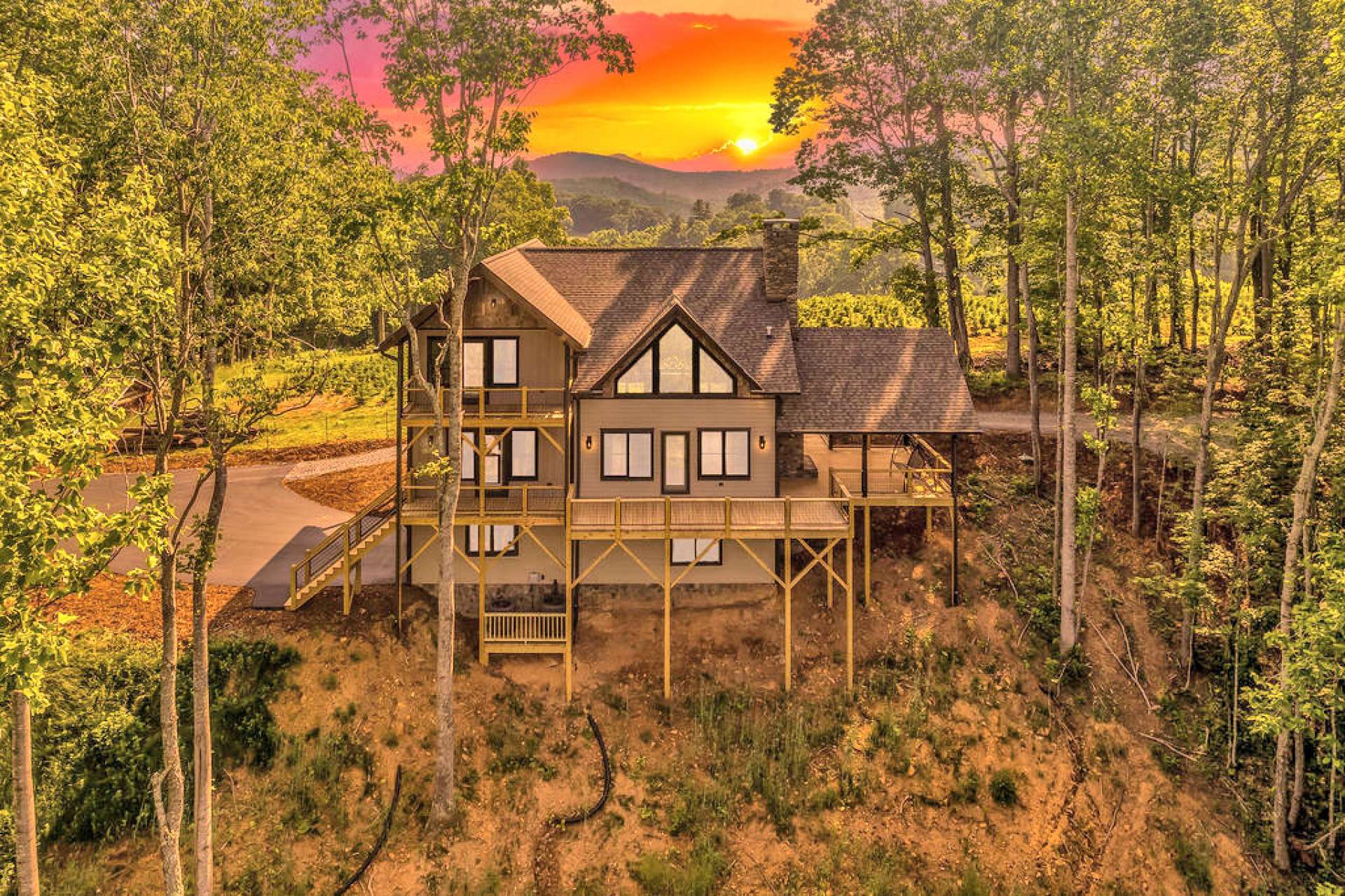 Welcome to your brand new NC Mountain home retreat where every sunrise and sunset leaves a sense of awe and every season presents a colorful surrounding.
