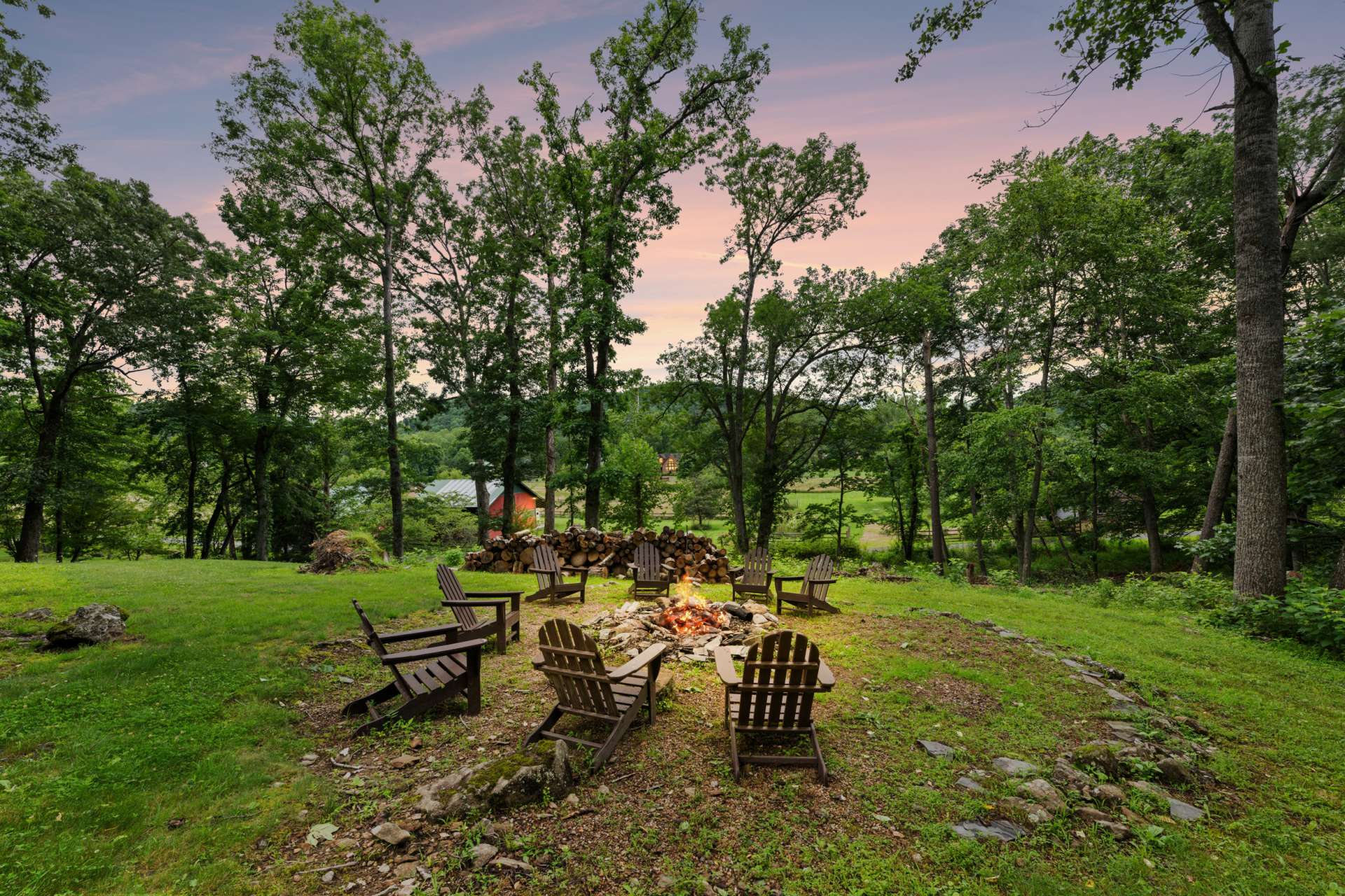 Spend starlit evenings by the dancing flames of the natural stone fire pit.
