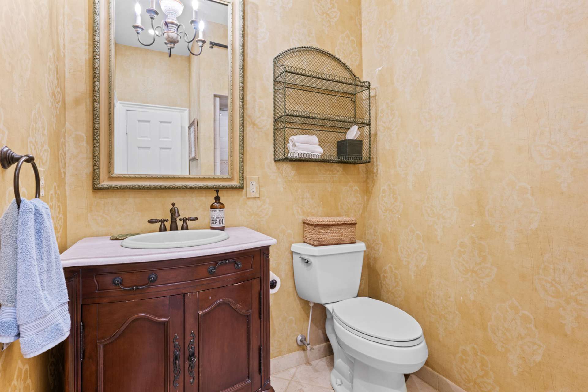 A shared Jack-and-Jill bath offers direct access from both the guest room and main hall.