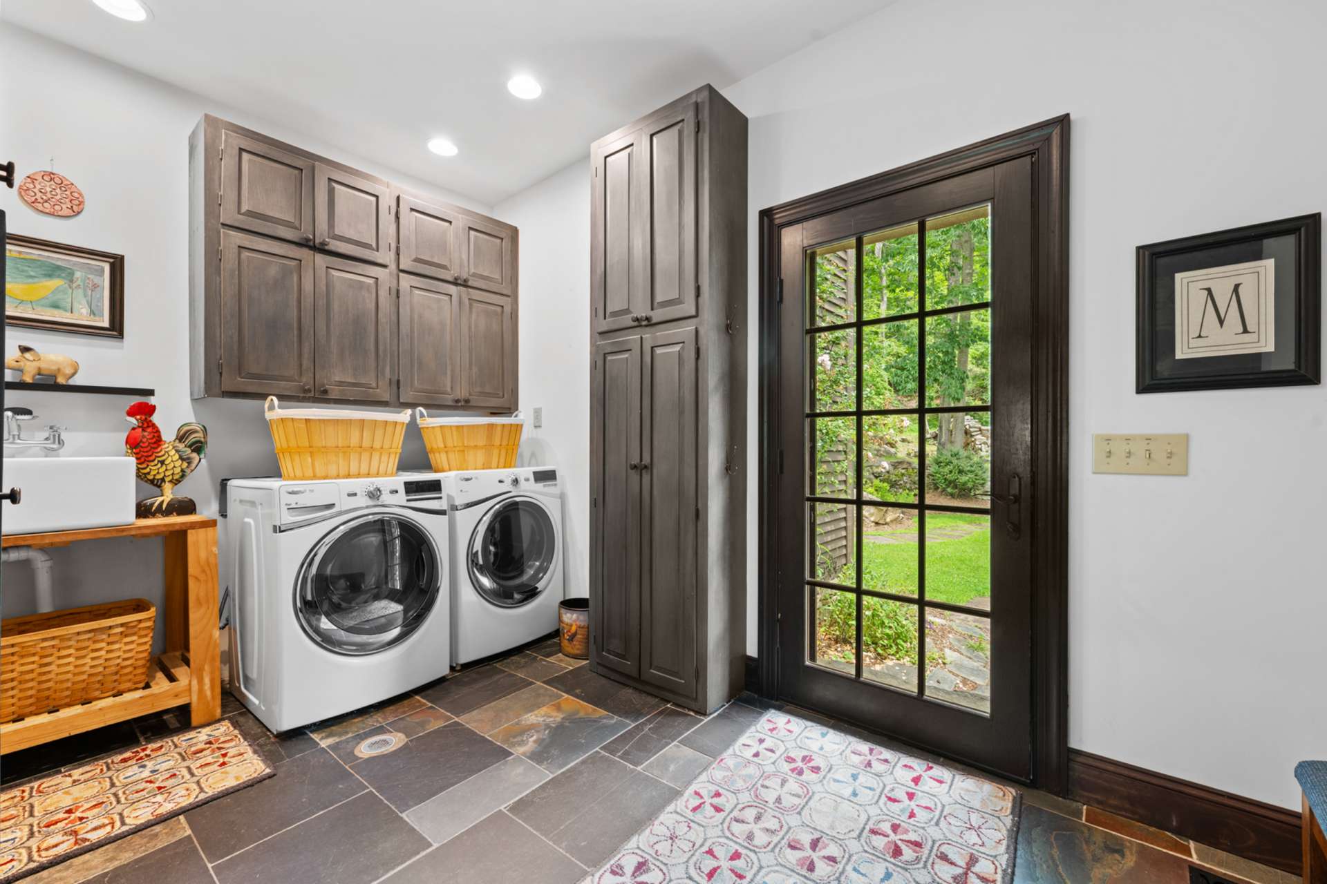 After time in the garden, the mudroom makes cleanup effortless—with a sink and laundry close at hand.