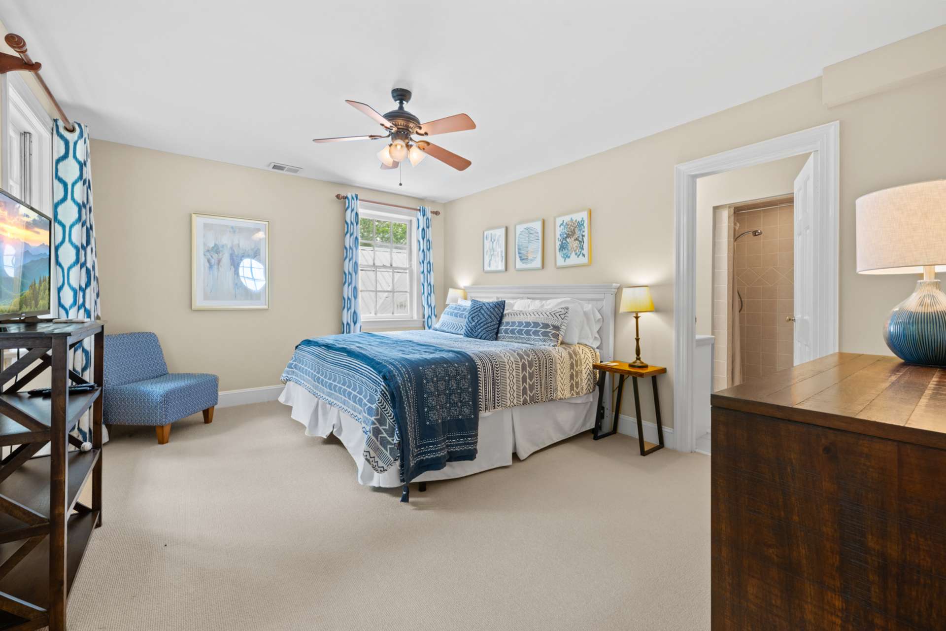 Sunlight fills this spacious upstairs retreat, designed for restful stays.