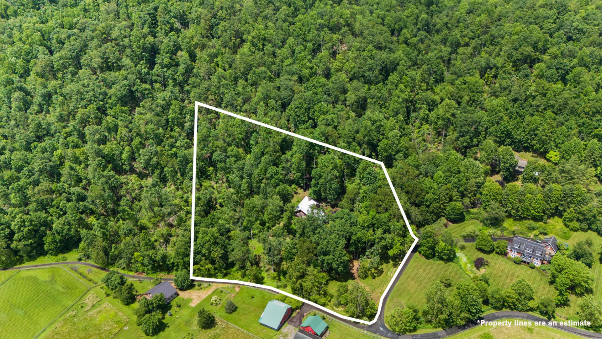 Tucked away in peaceful privacy, yet still intimately connected to one of the region’s most beloved mountain communities.