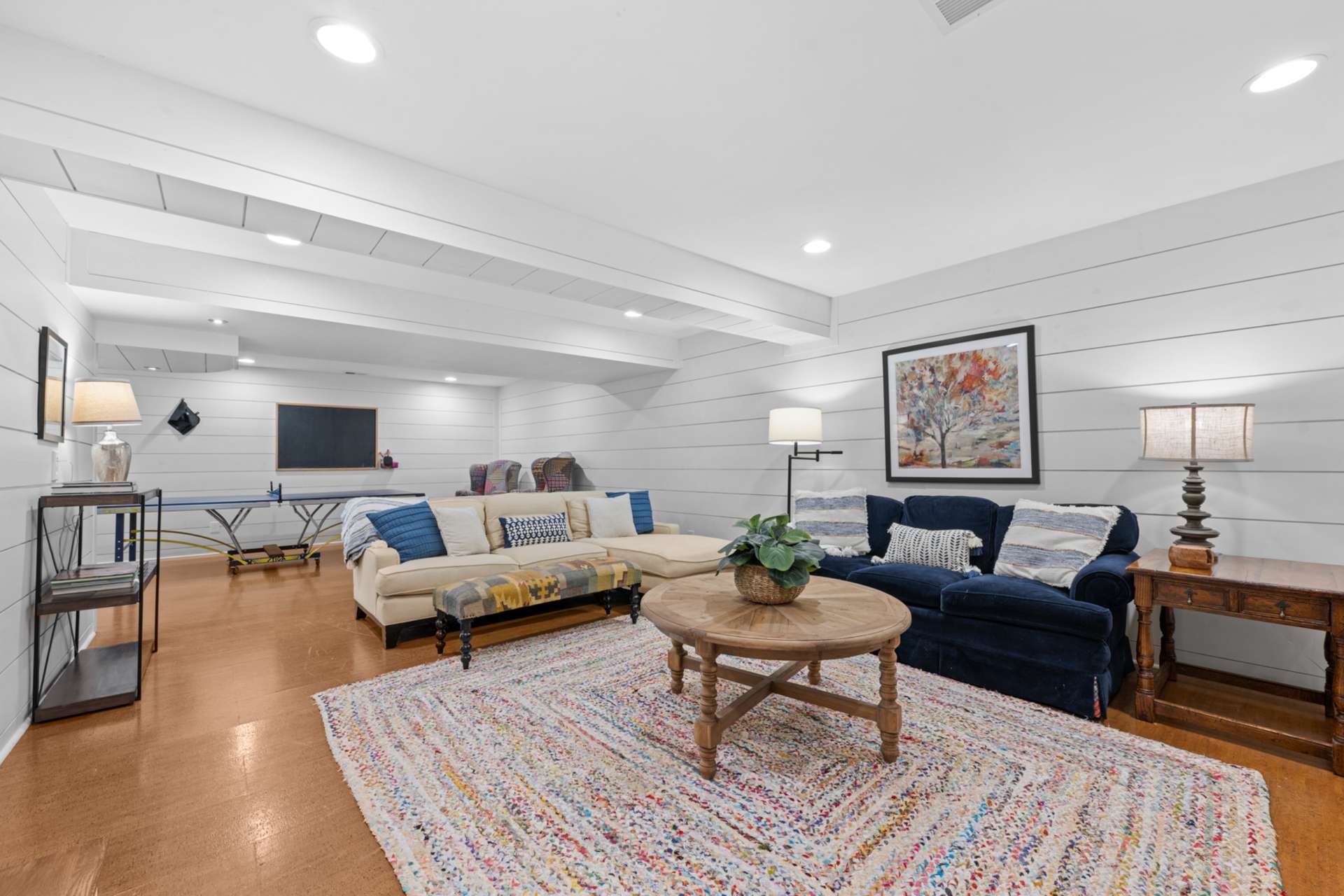 The lower-level family room offers a welcoming space to unwind, gather, and enjoy.