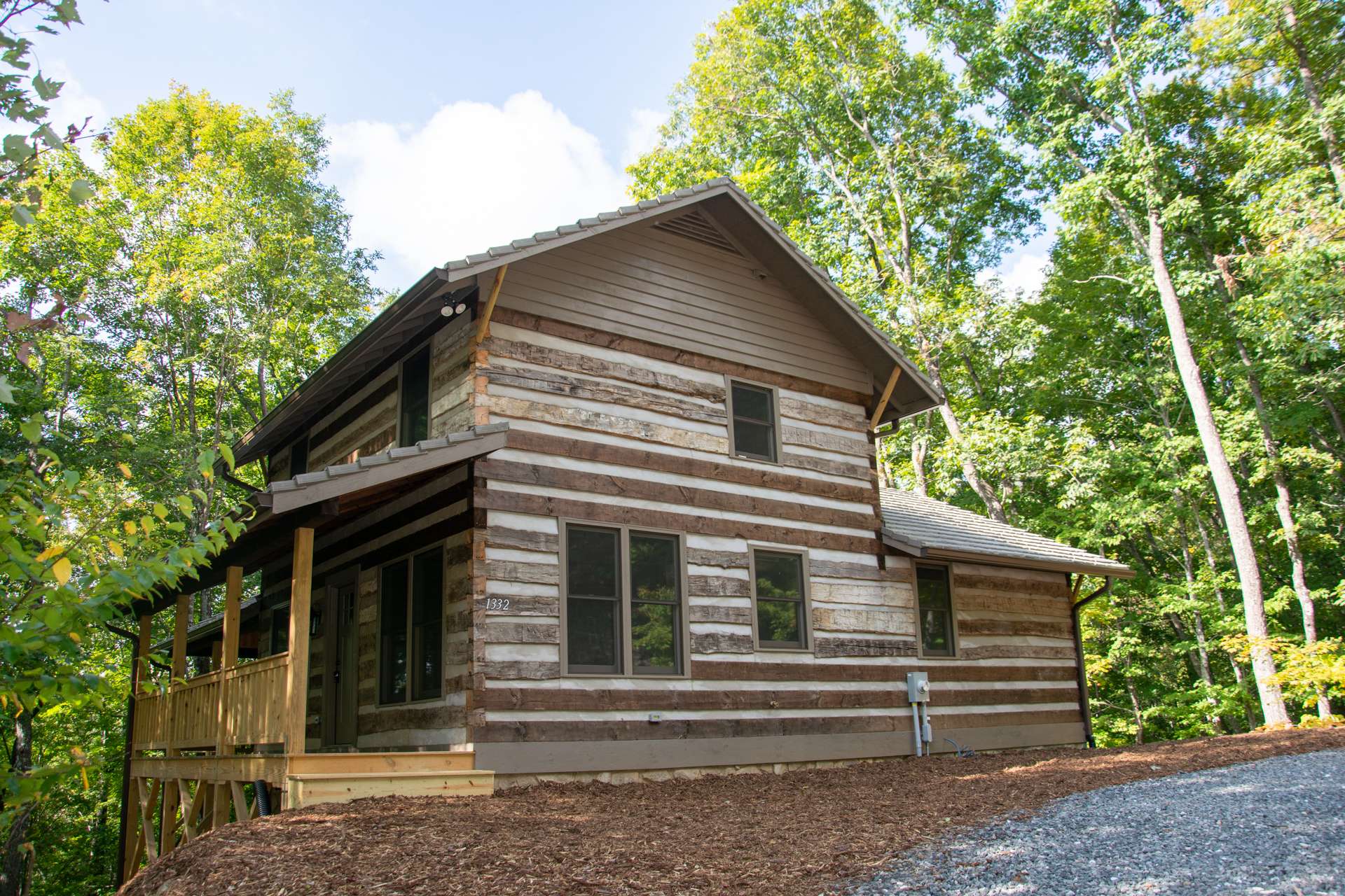 Completion is nearing  just in time to enjoy the colorful fall foliage in your brand new log cabin in the mountains of North Carolina.  H177