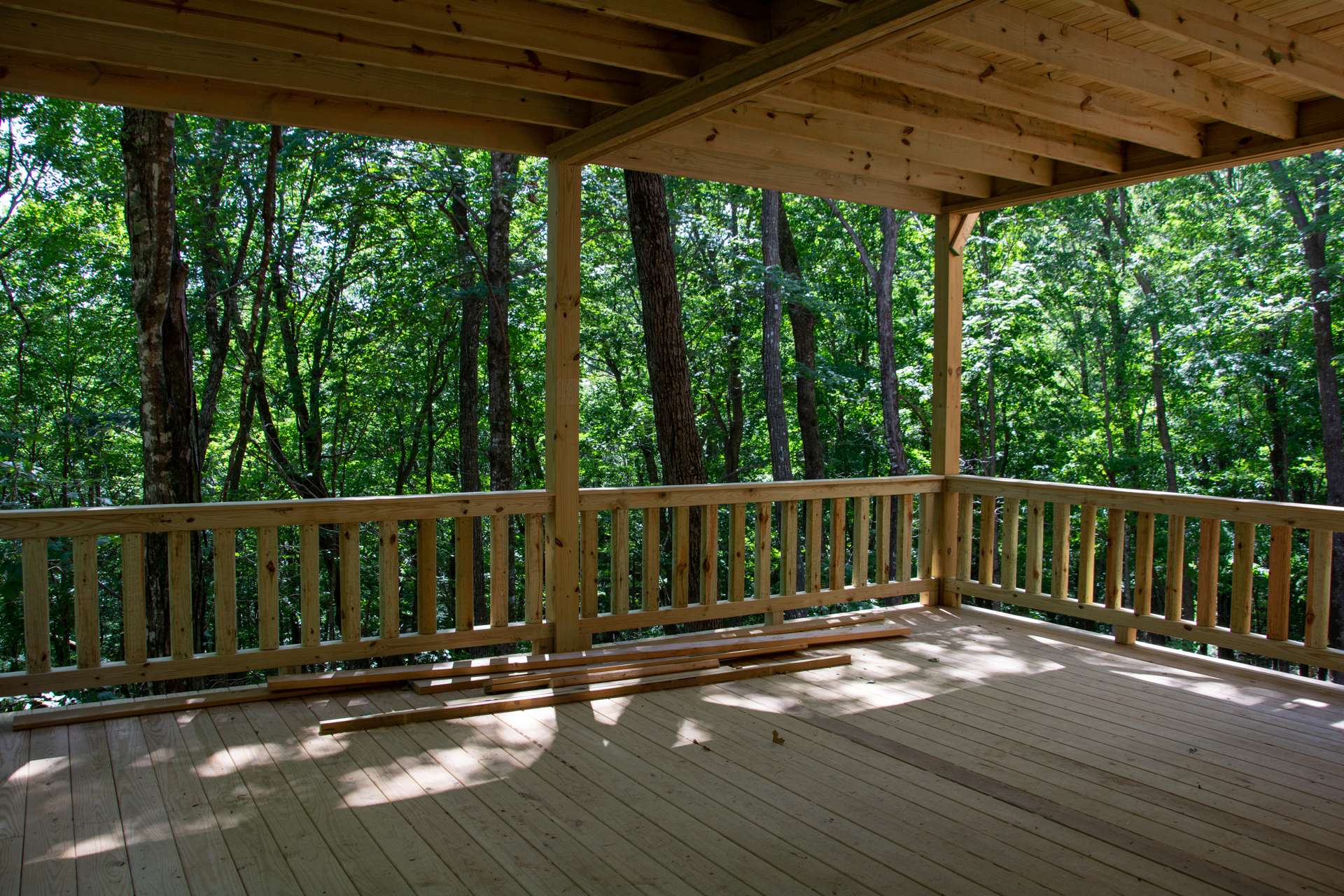 Relaxing on either of the outdoor decks and porches give you the feel of being in a treehouse.