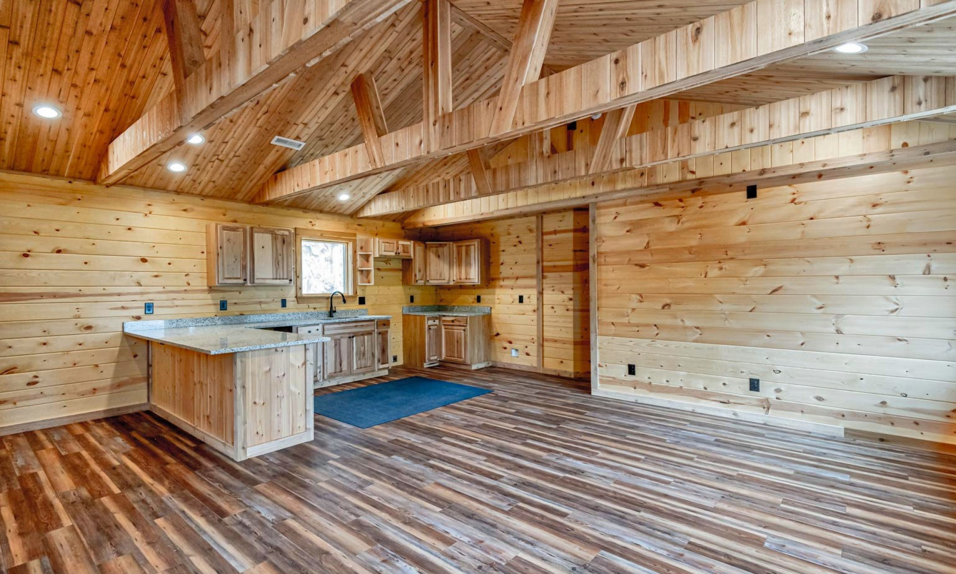 Enjoy privacy and incredible layered long range mountain views from this new mountain cabin located just off of Homestead Drive in the Wilkes area of the North Carolina Mountains.
