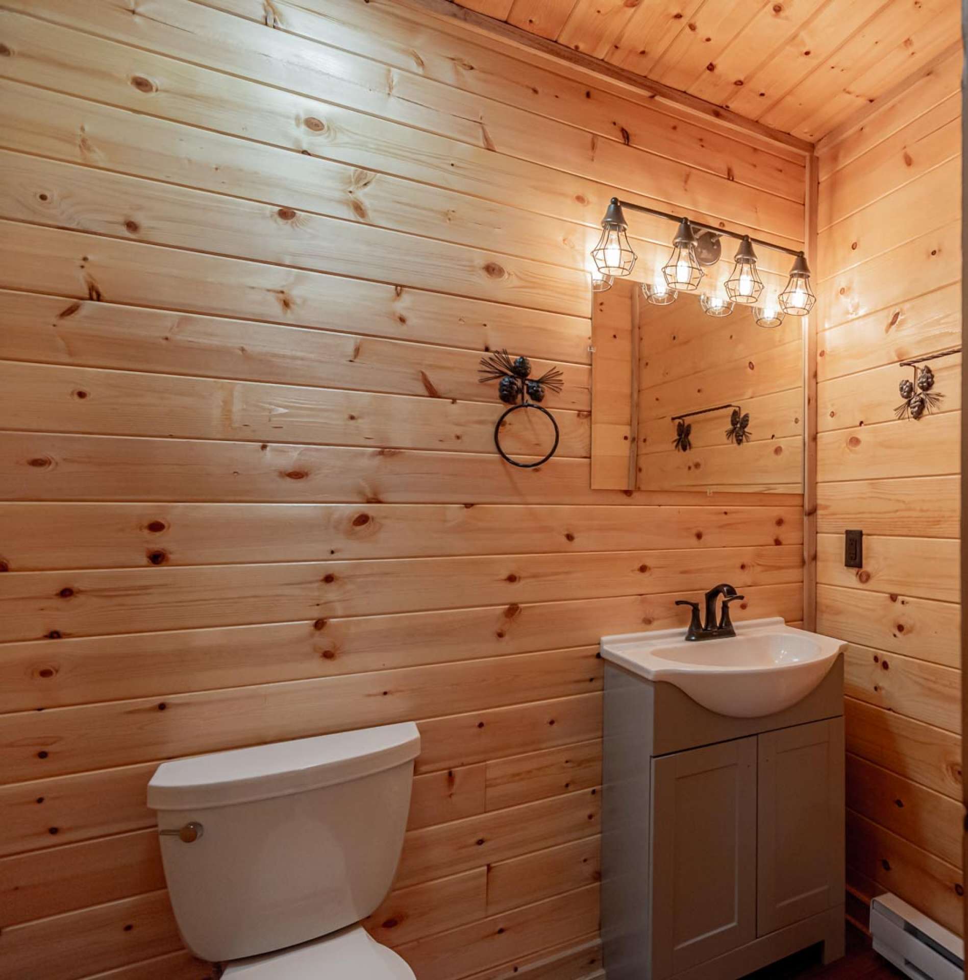 The guest cabin features a a full bath with tiled shower.