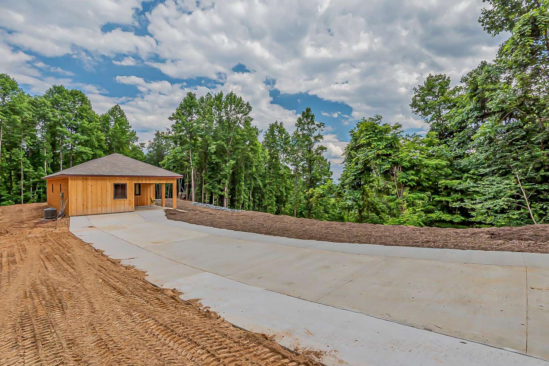 This property offers a paved drive into a private 3 acre setting.
